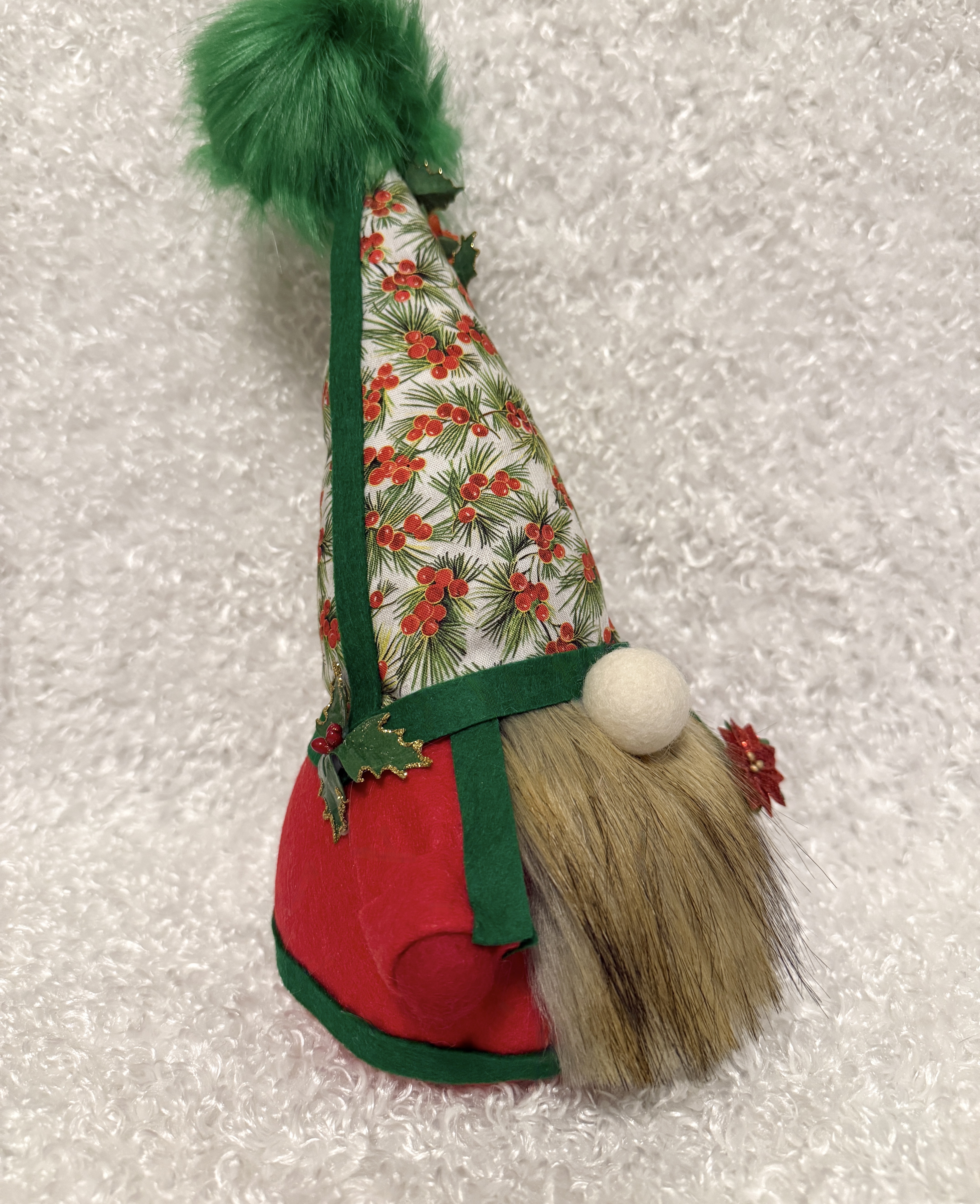 Red and Green Christmas Gnome with Holly Covered Hat, Fluffy Brown Beard, Holding Poinsettias, Cute Xmas Decor