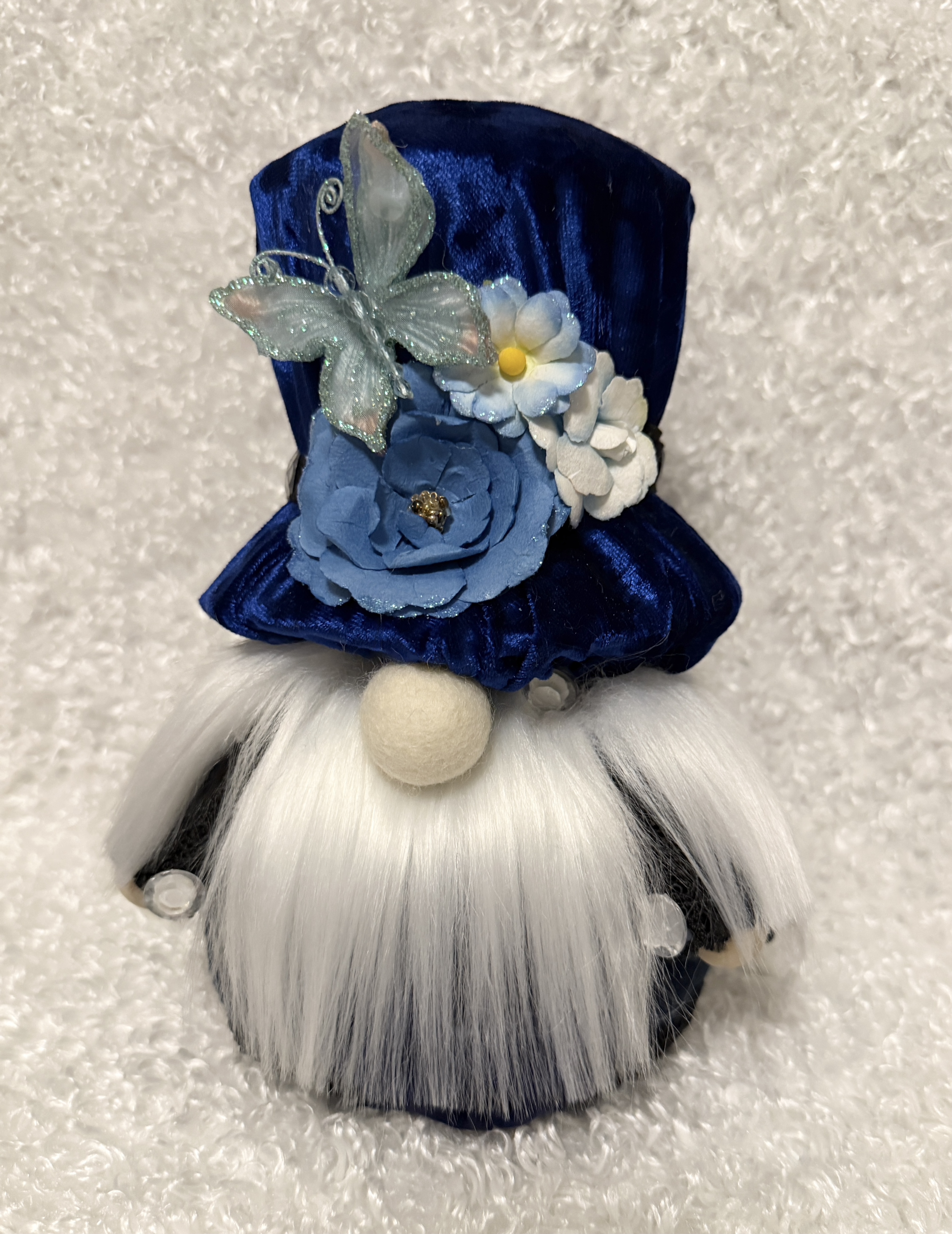 Charming Gnome with Blue Velvet Hat and Butterfly and Floral Accents