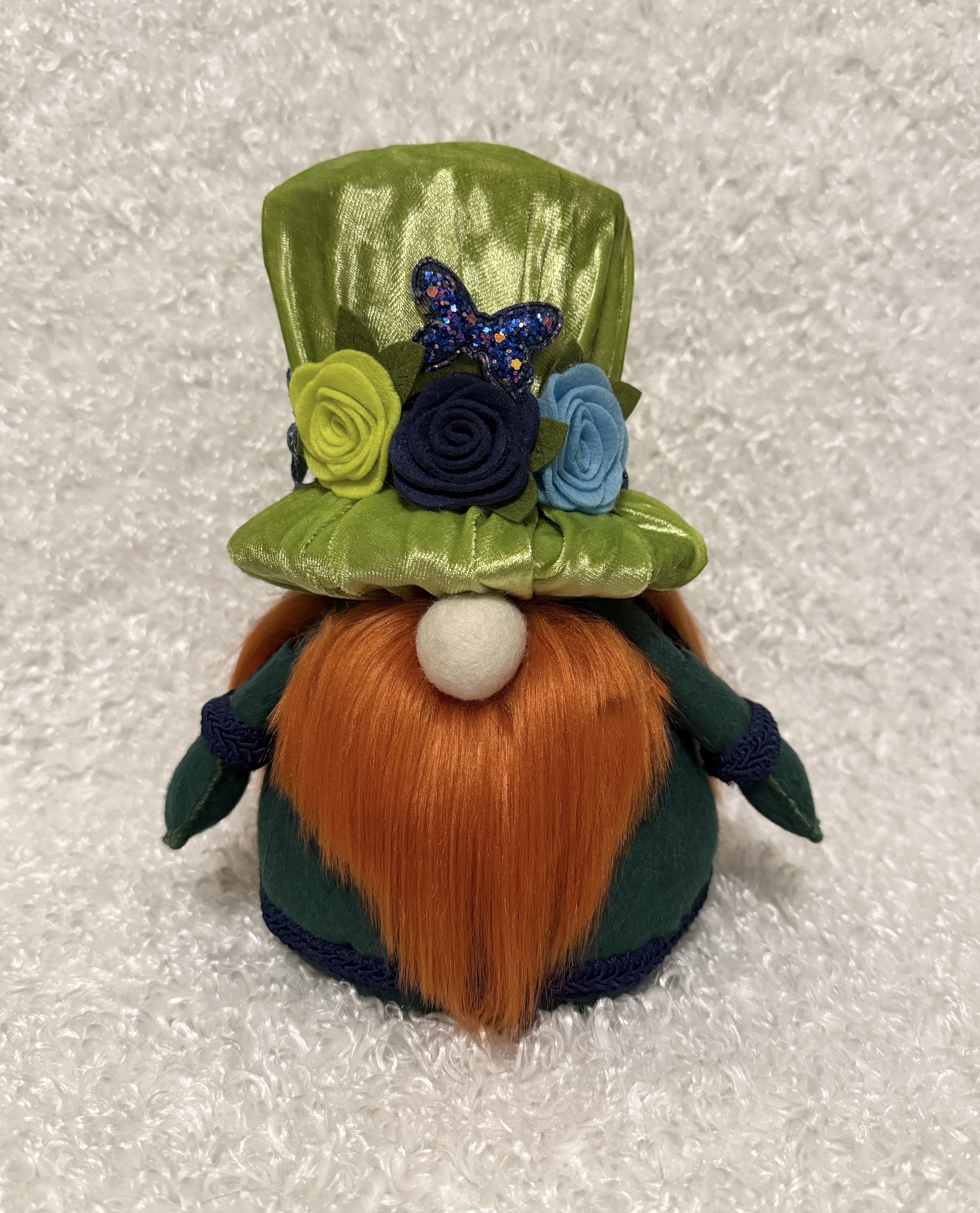 Decorative Gnome with a Green Hat and Flower Accents