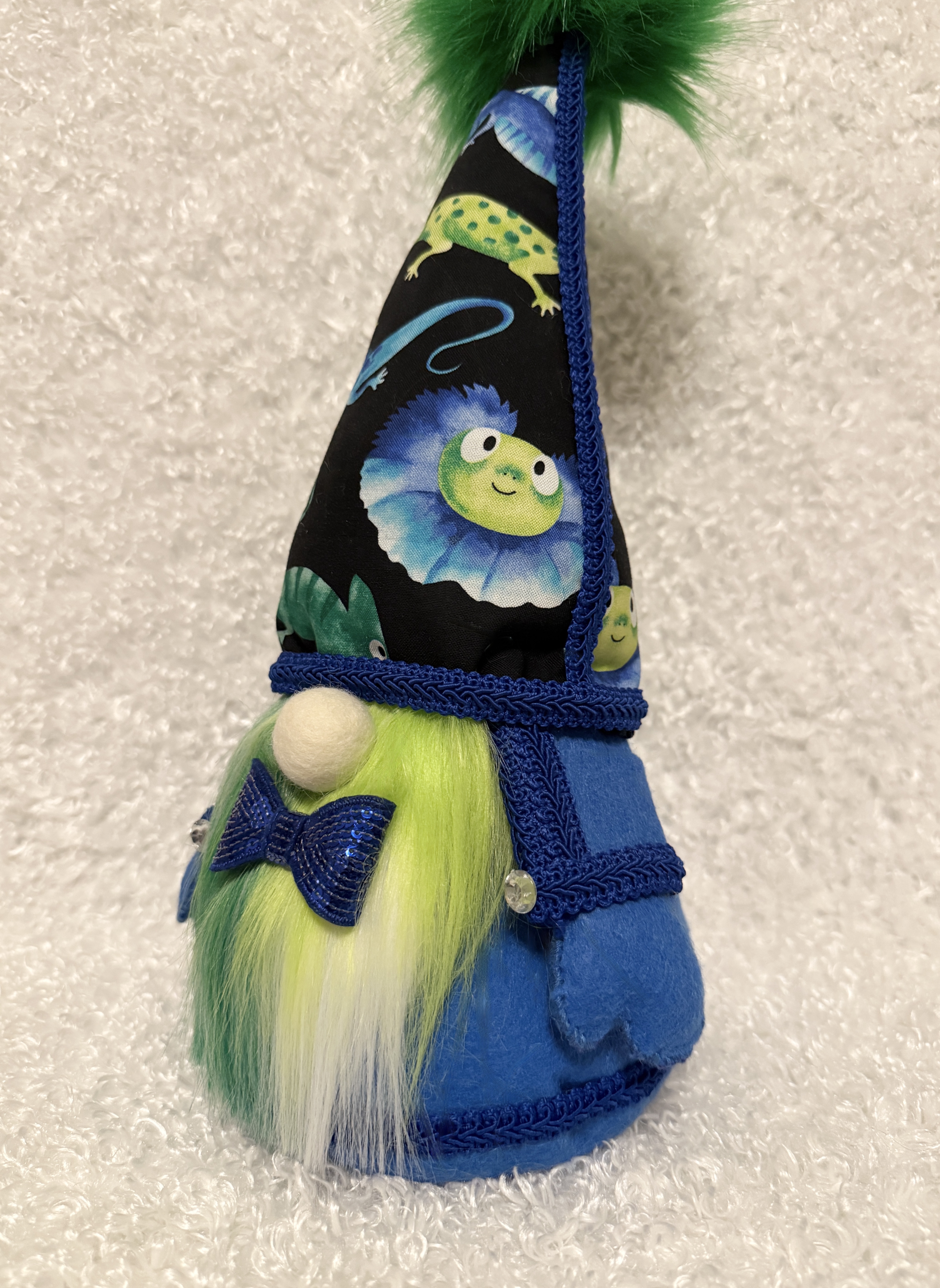 Whimsical Gnome with Lizard-Themed Hat and Fluffy Green Shaded Beard