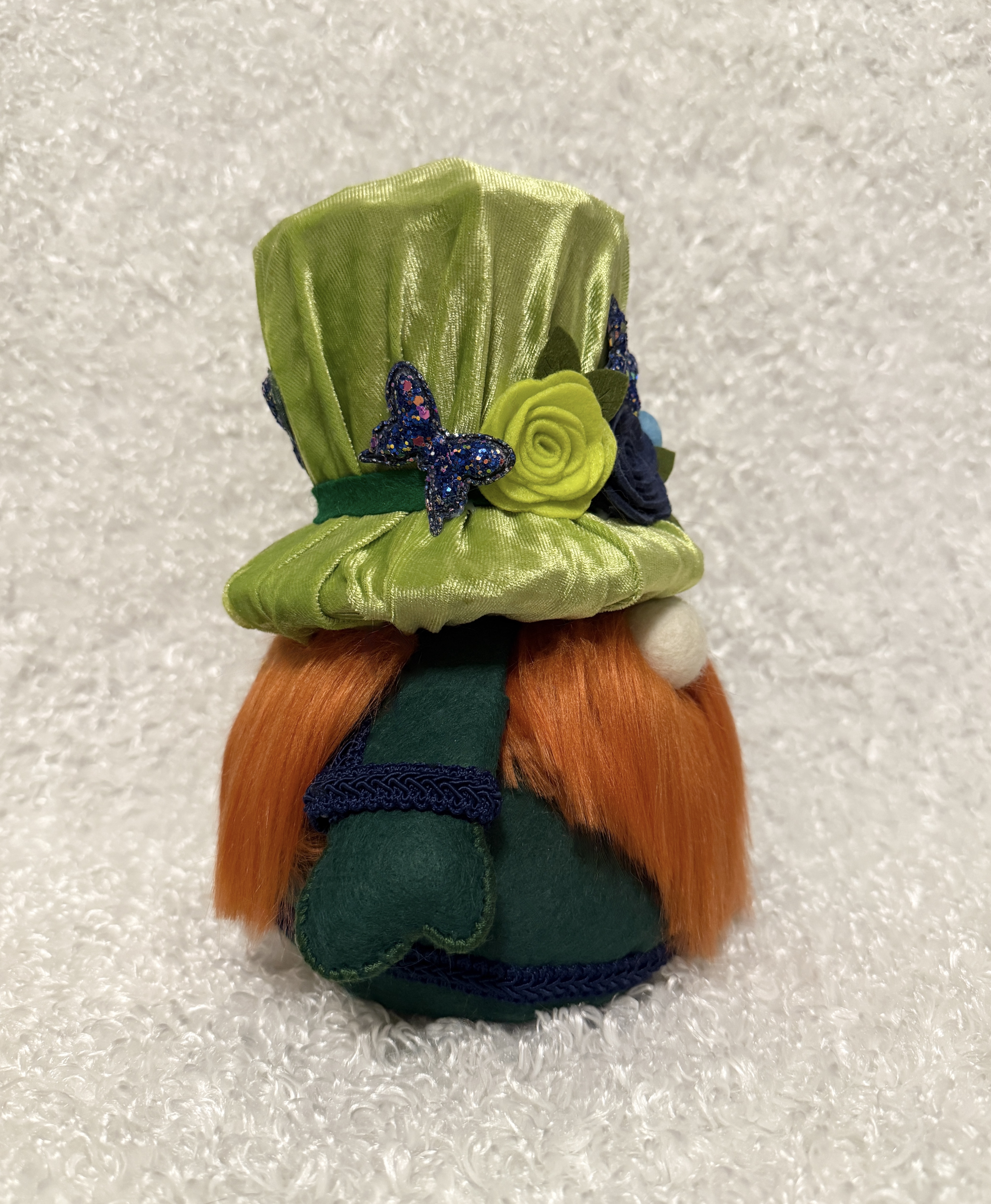 Decorative Gnome with a Green Hat and Flower Accents