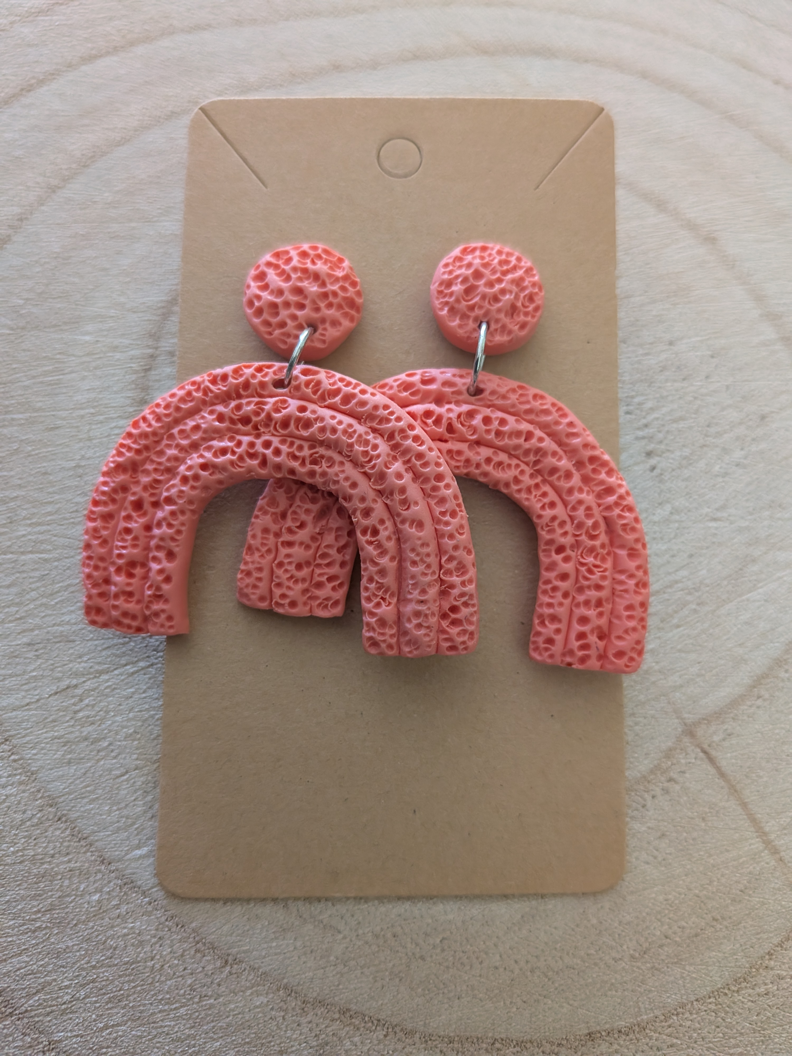 Beautiful Textured Coral Dangly Arch Earrings