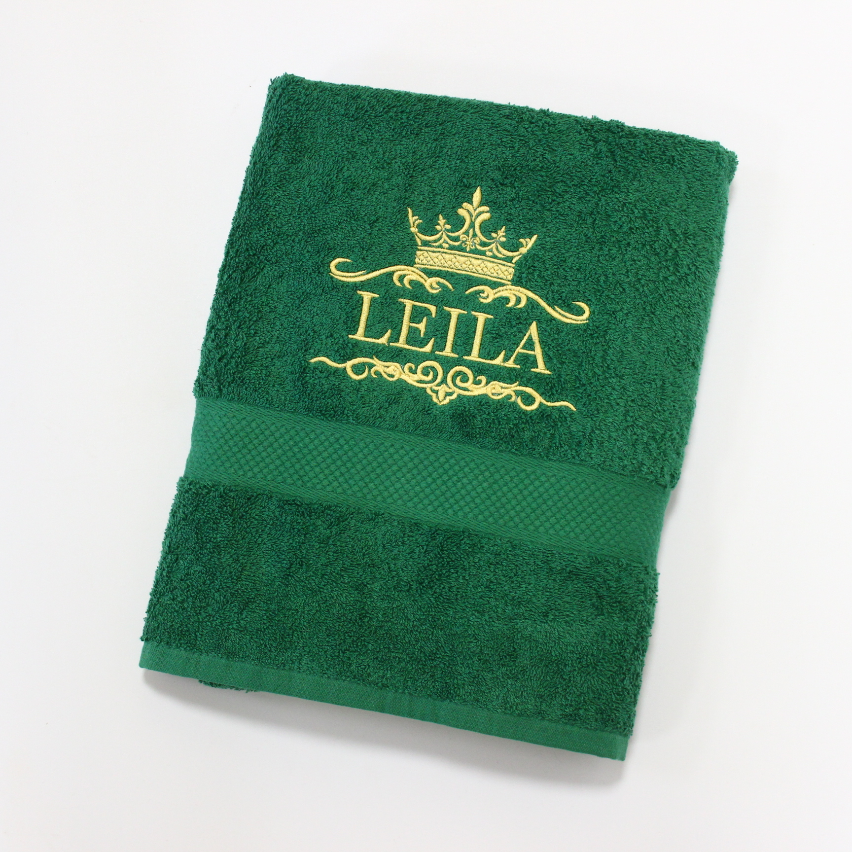 Rankšluostis su užrašu "Border Crown"