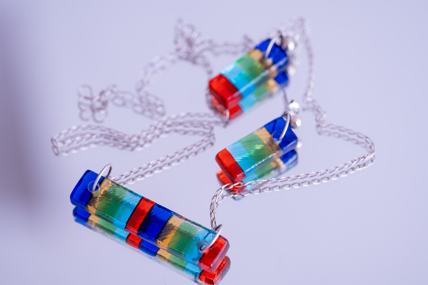 Collar de vidrio Luz Cromática
