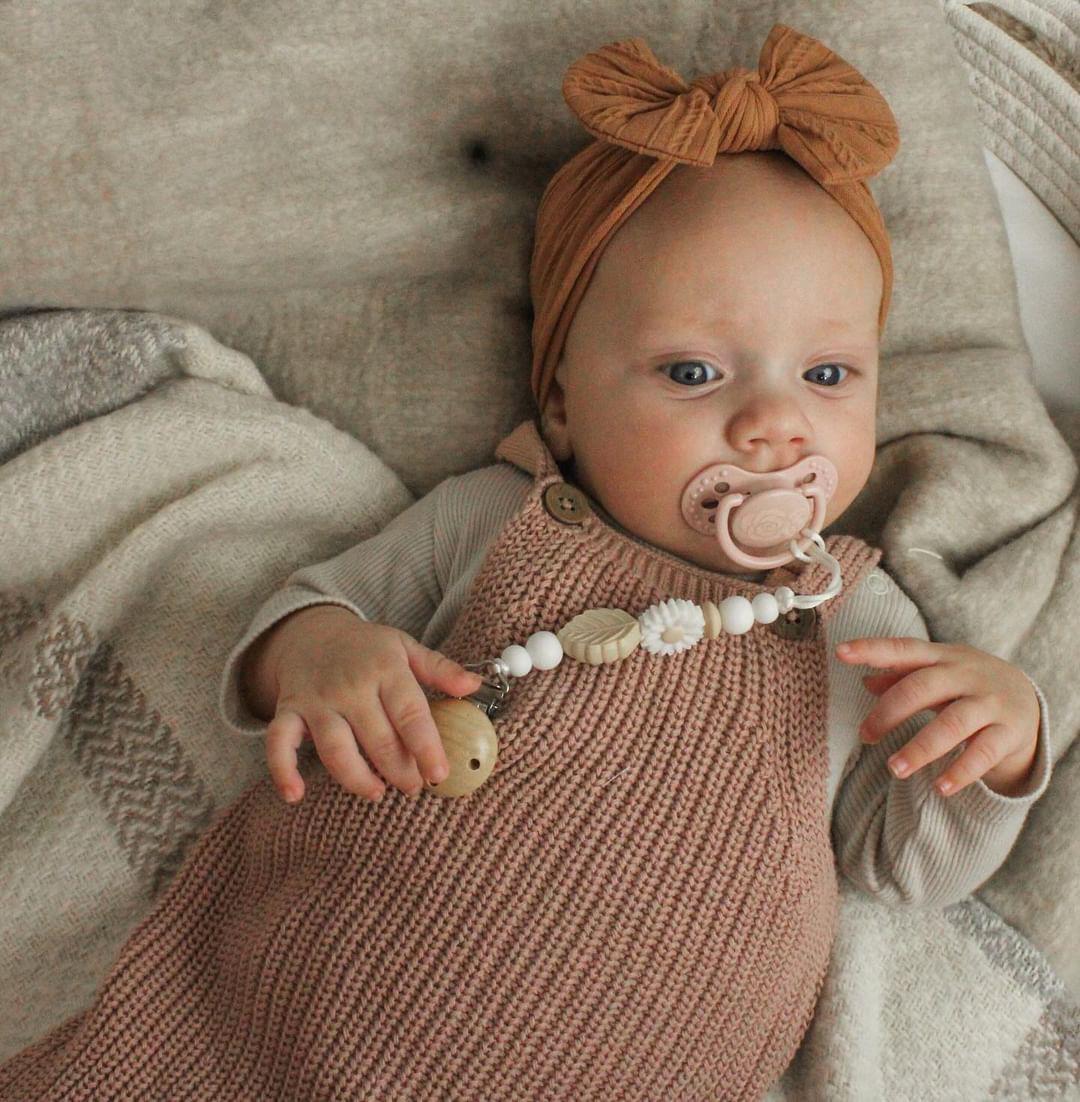 Naujagimio čiulptuko laikiklis RAMUNĖLĖ, baltas