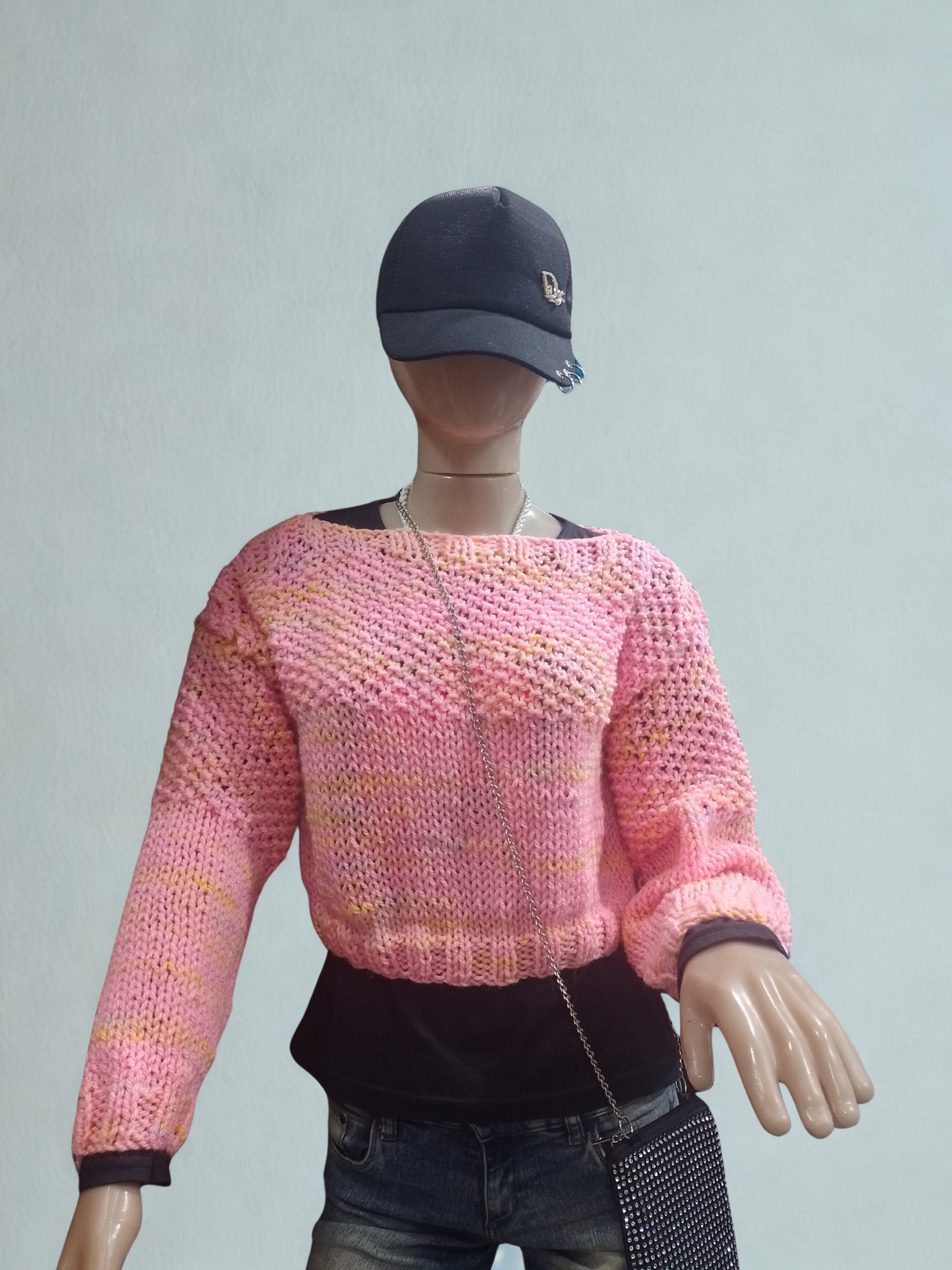 Suéter tejido rosa