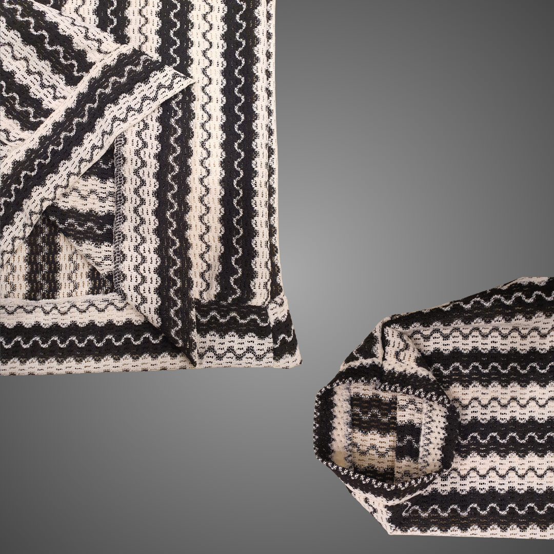 Black and white zigzag striped polo shirt
