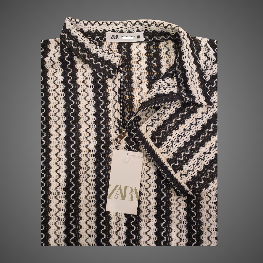 Black and white zigzag striped polo shirt
