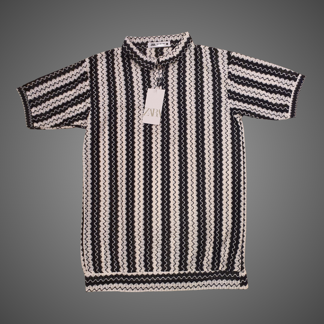 Black and white zigzag striped polo shirt