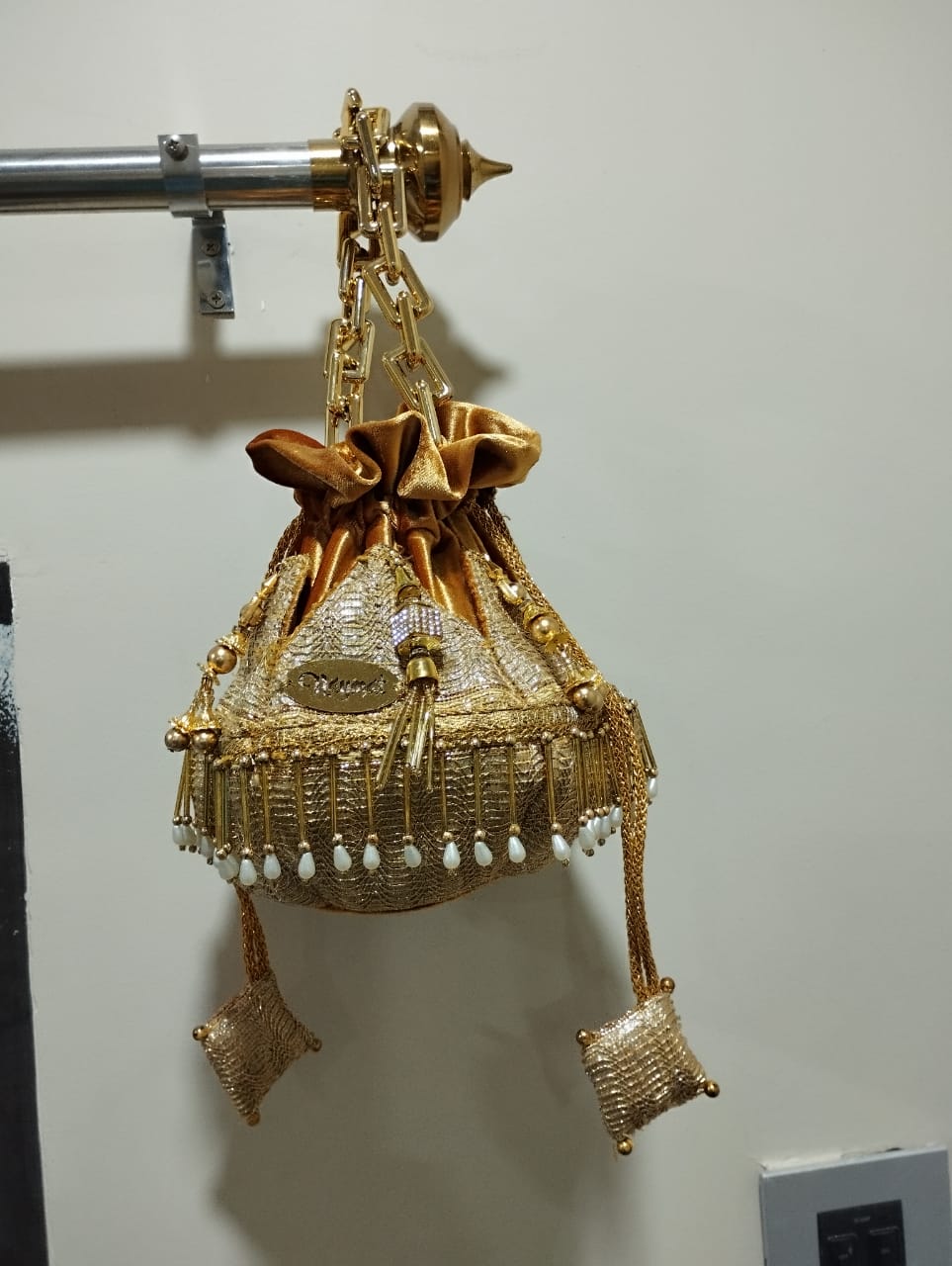 Designer golden potli bag