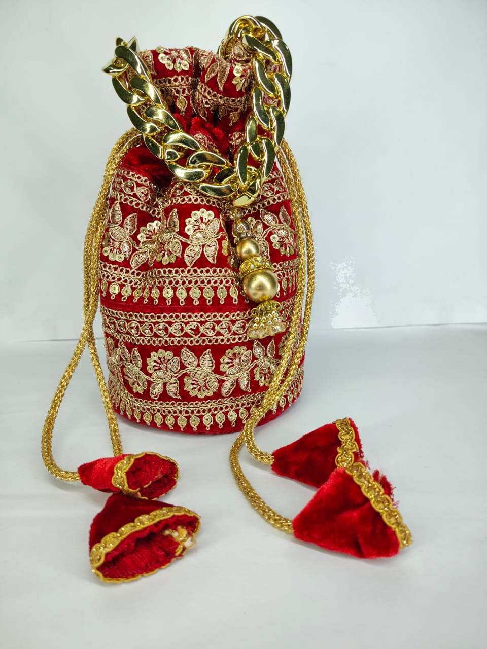 Red embroidered potli bag