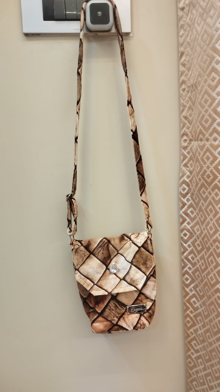 Brown patterned crossbody bag
