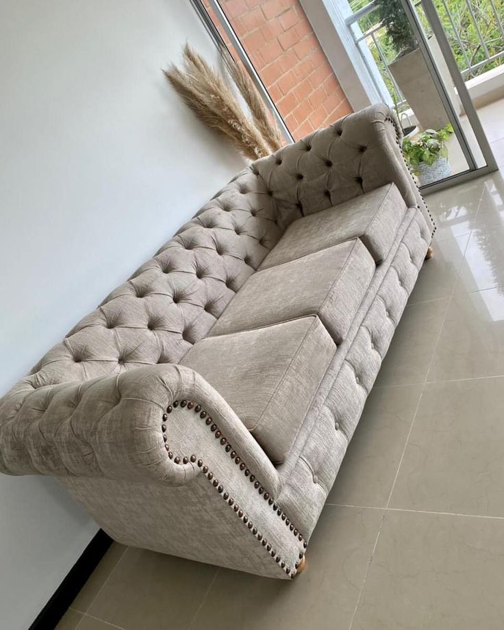 Elegant Beige Chesterfield Sofa