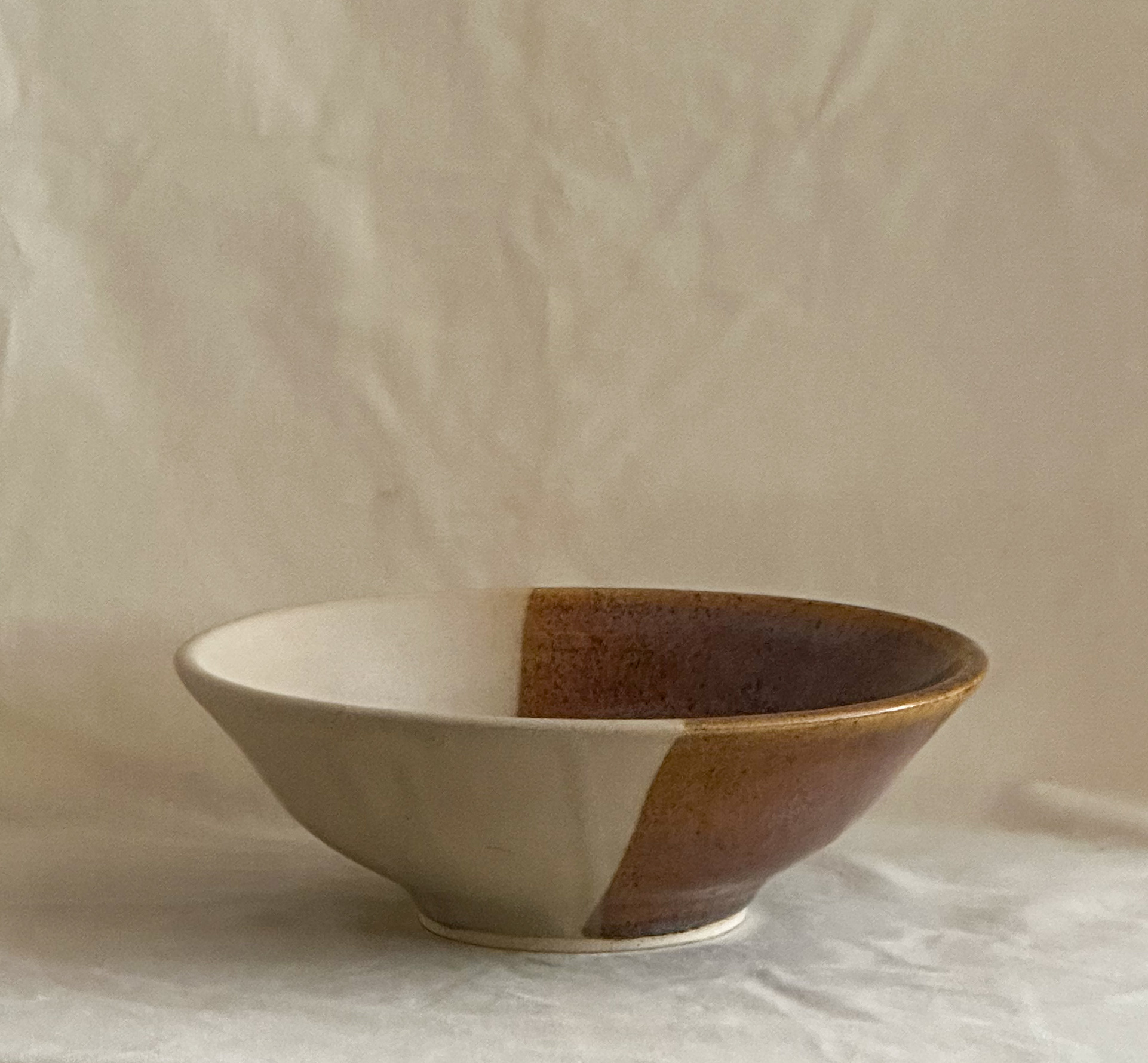 Wide serving bowl in brown and tan