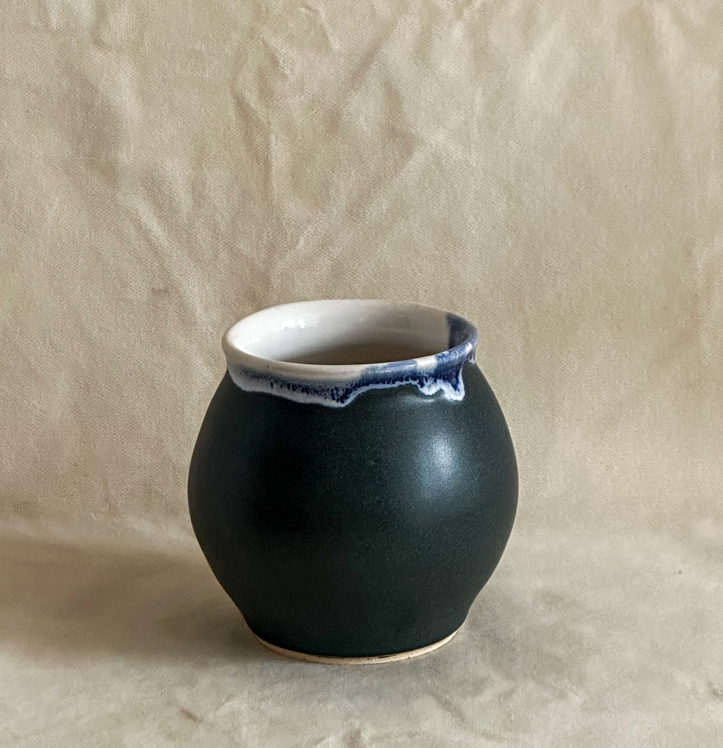 Small vase in matte green