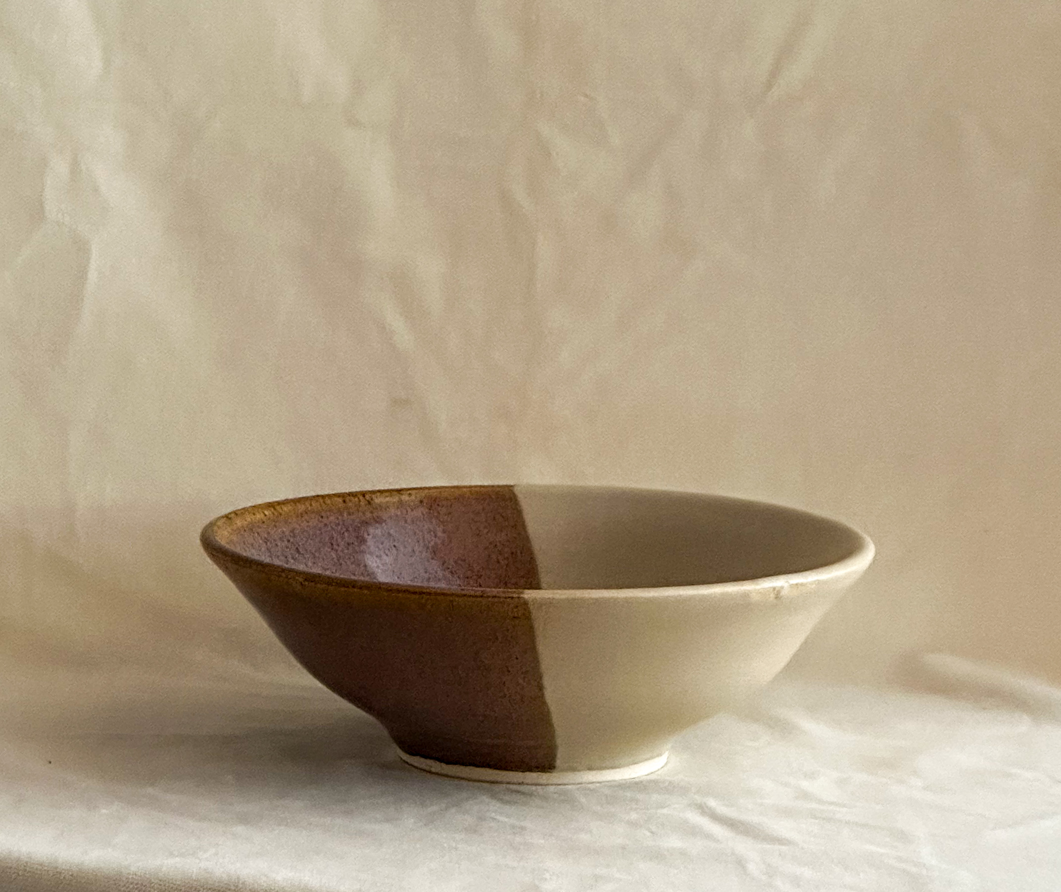 Wide serving bowl in brown and tan
