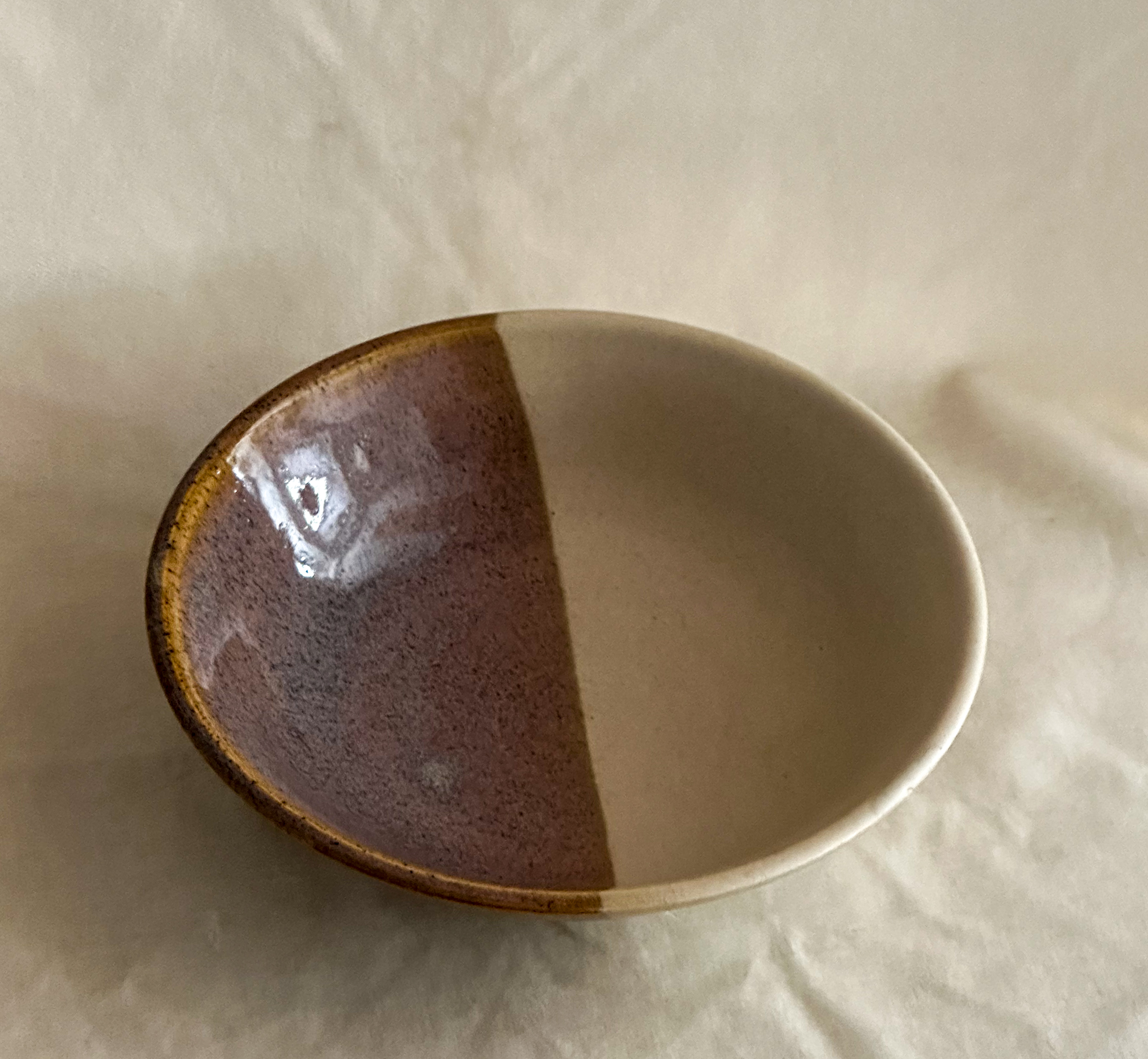Wide serving bowl in brown and tan