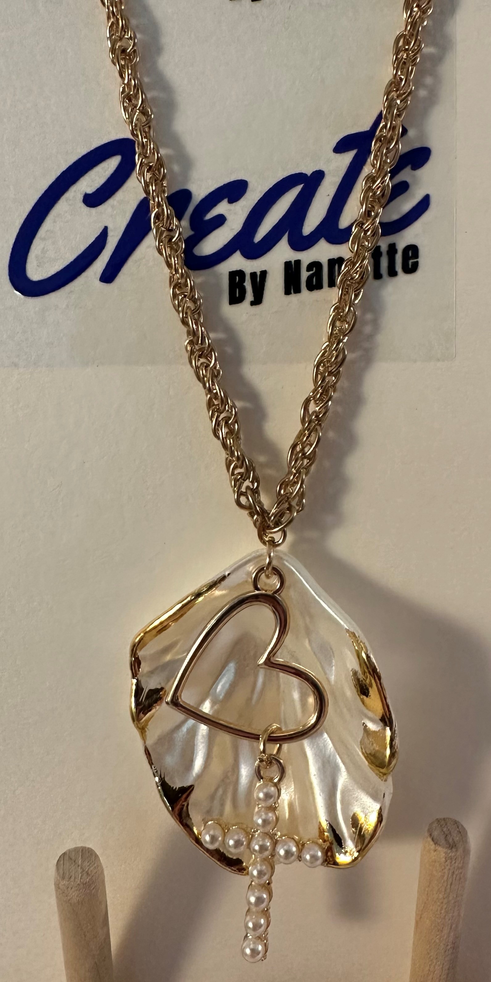 Shelled Cross and Heart 