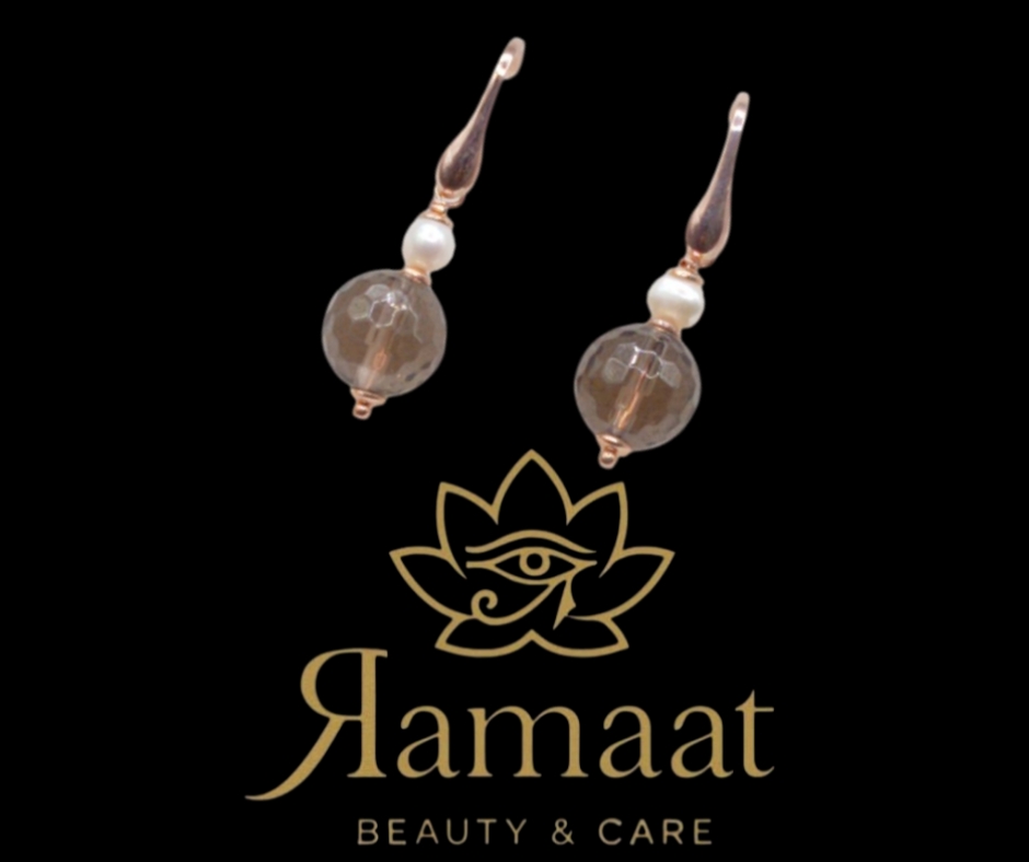 Eleganti orecchini pendenti con pietre preziose