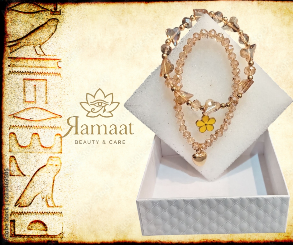 Set di braccialetti con perline dorate