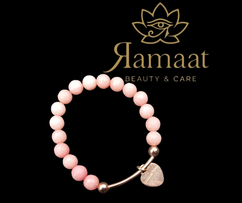 Bracciale con perline rosa e ciondolo a forma di cuore in bronzo