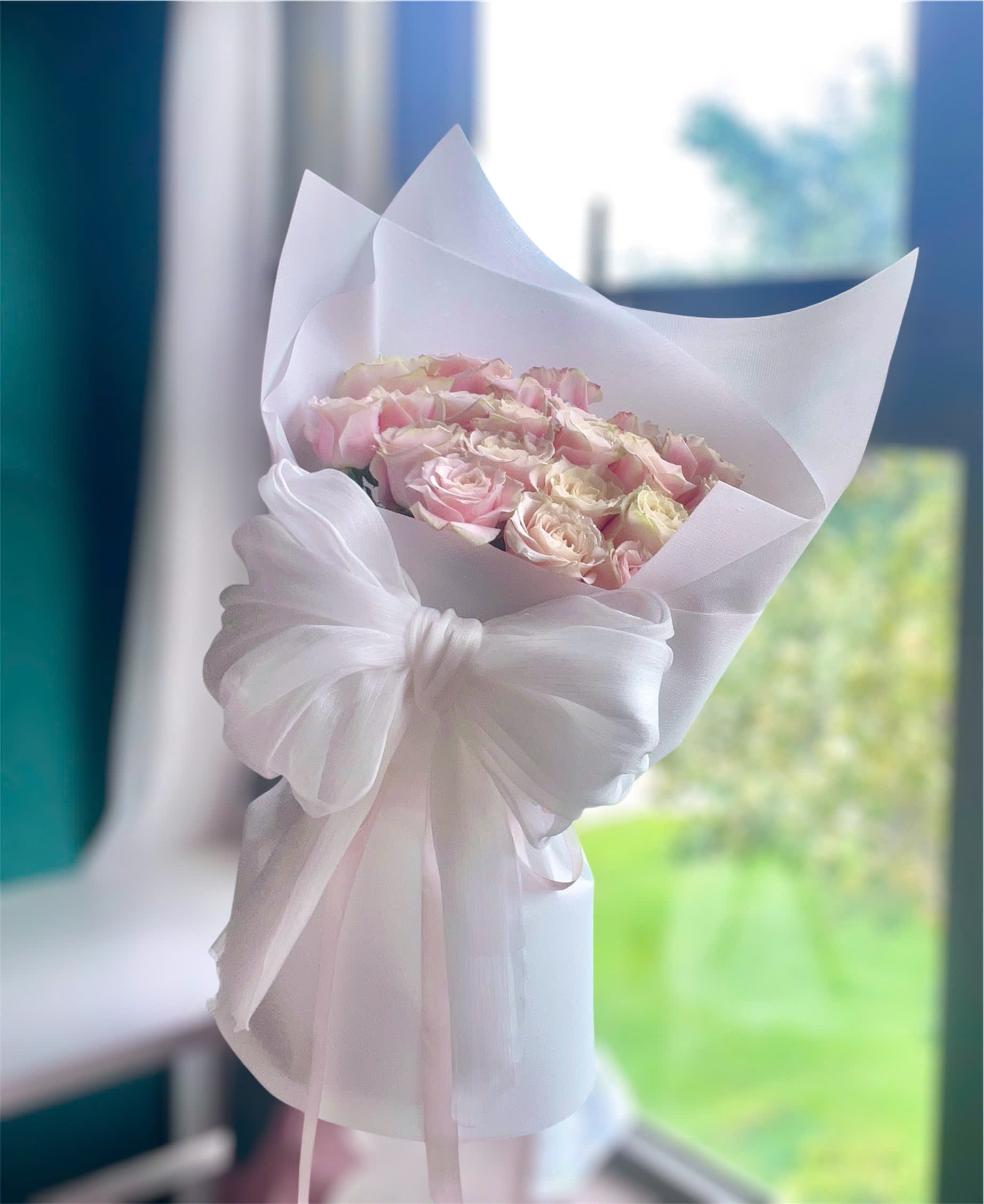Bó hoa hồng pastel nơ