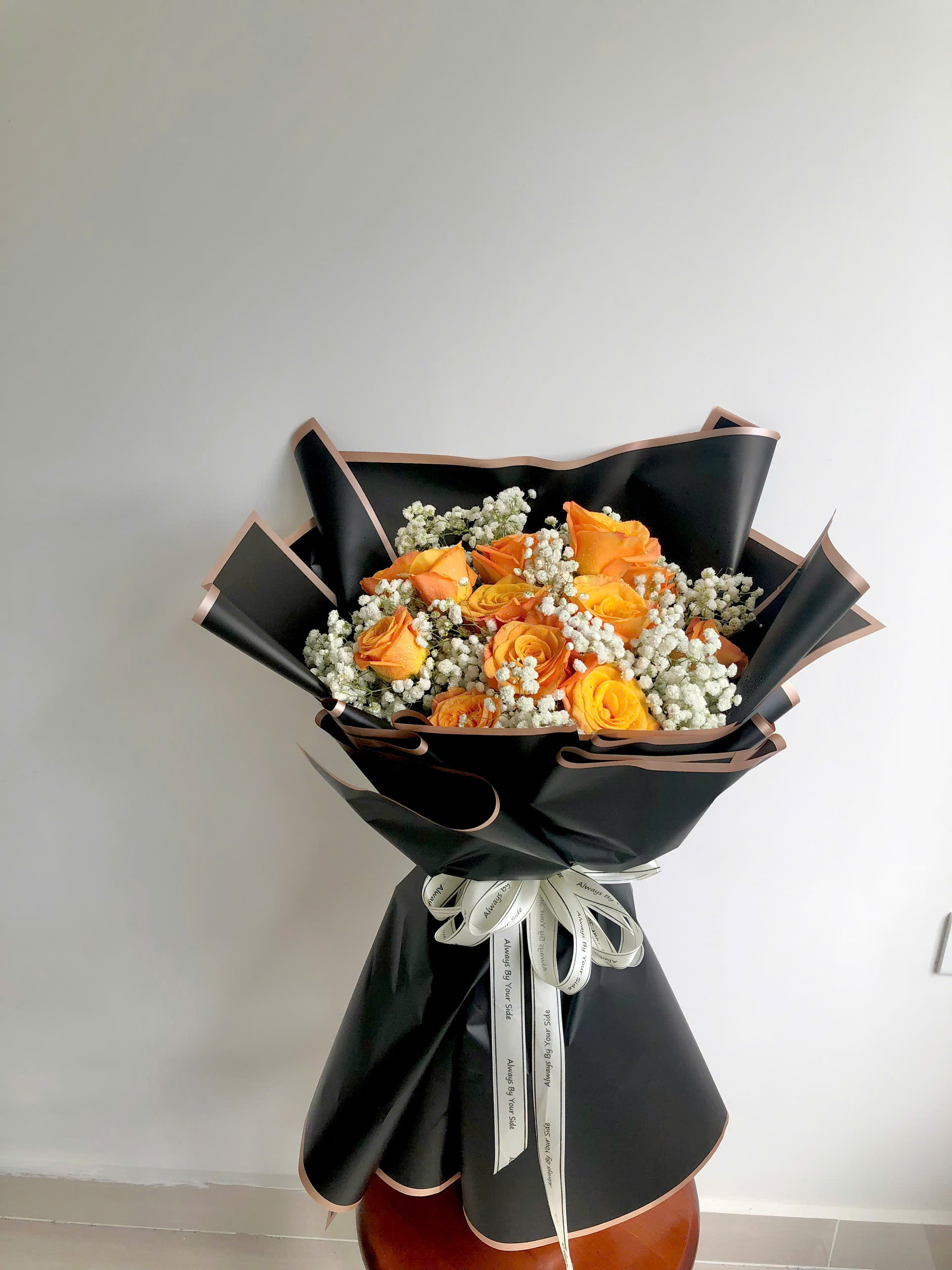 Bó hoa hồng cam tặng nam