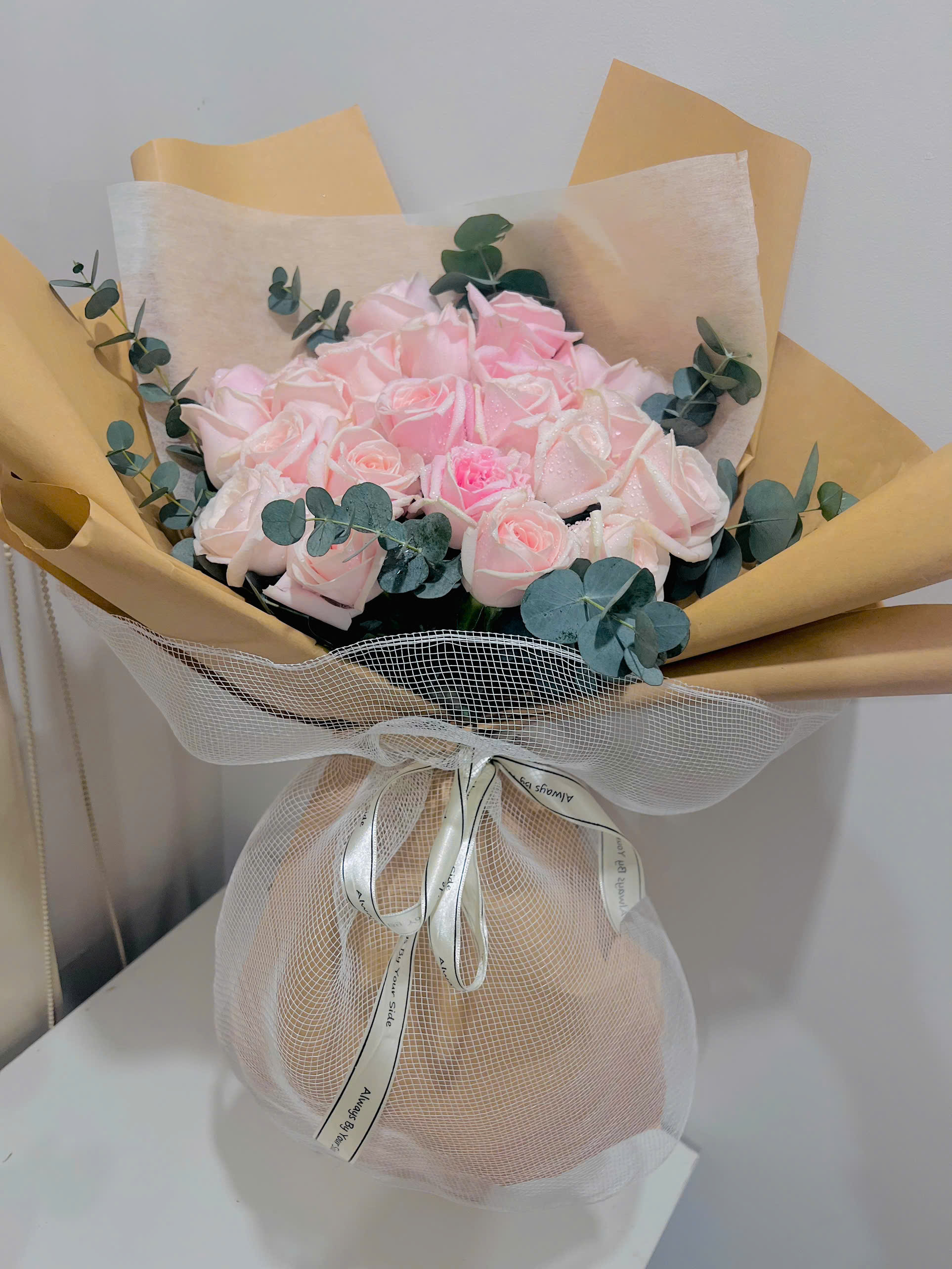 Bó hoa hồng màu hồng pastel