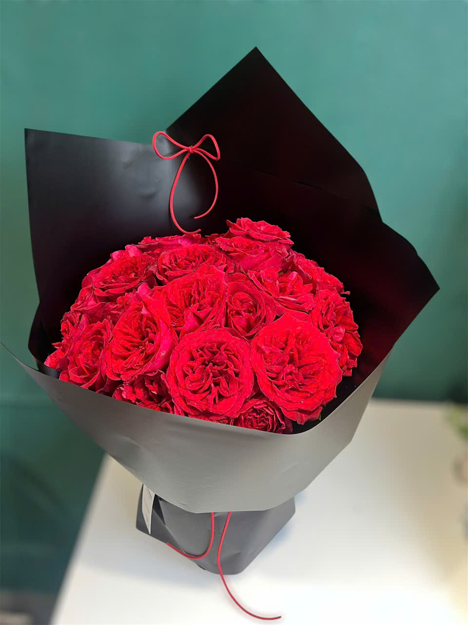 Bó hoa hồng đỏ tròn