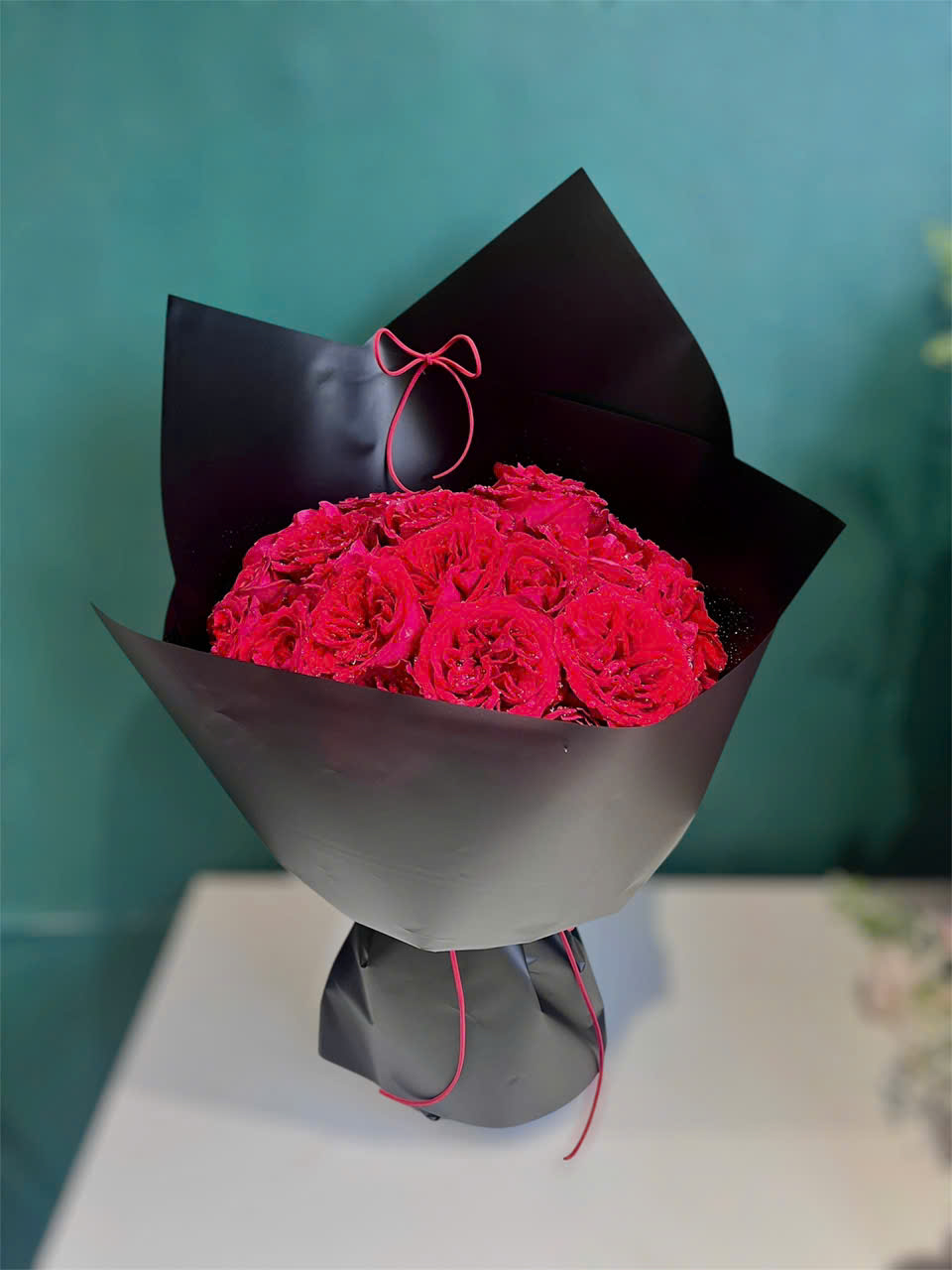 Bó hoa hồng đỏ tròn