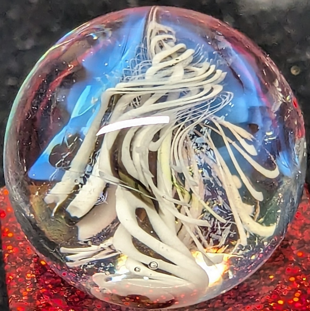 Very nice dollop hider with blue fume and "hairs"