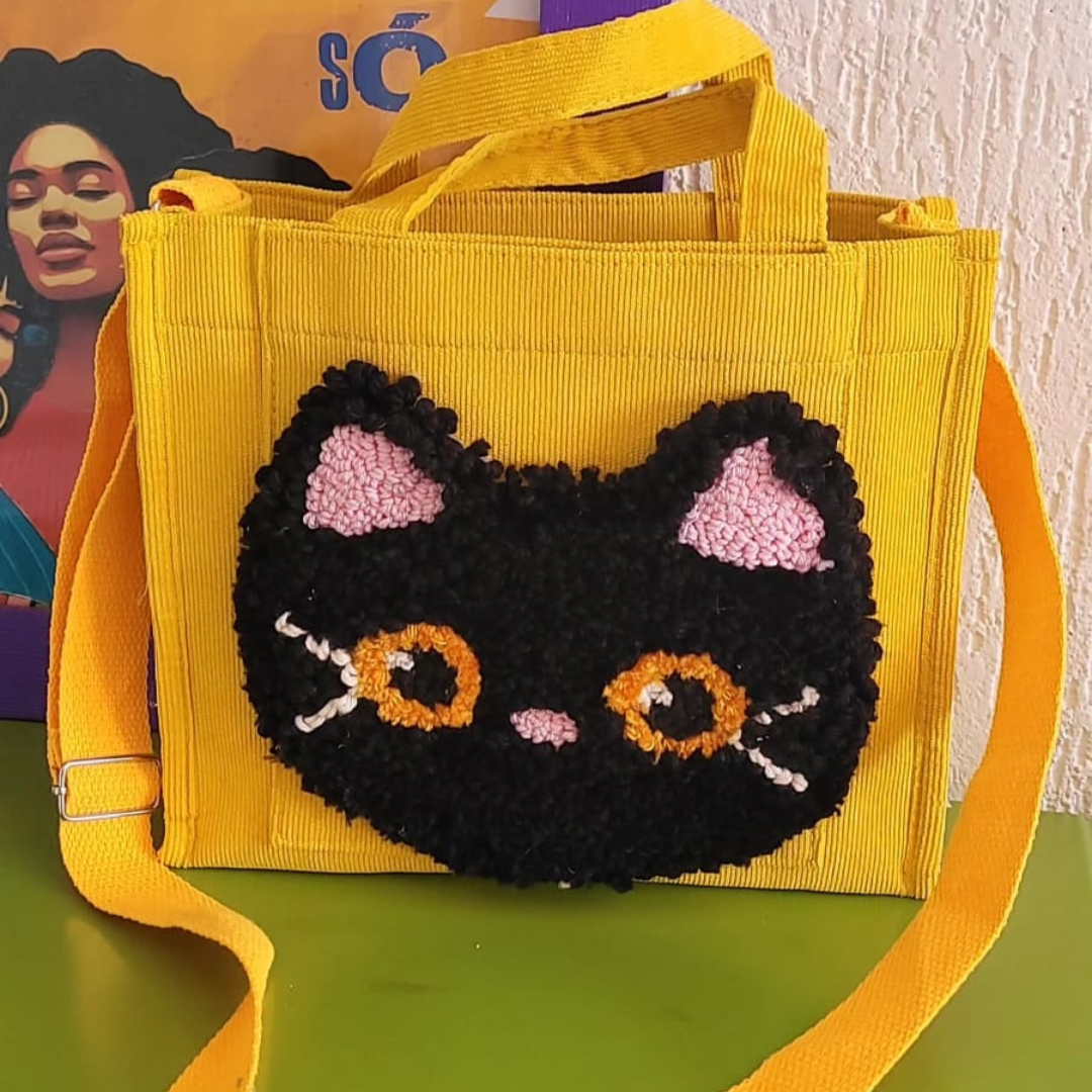 Bolsa com aplicação de gatinho