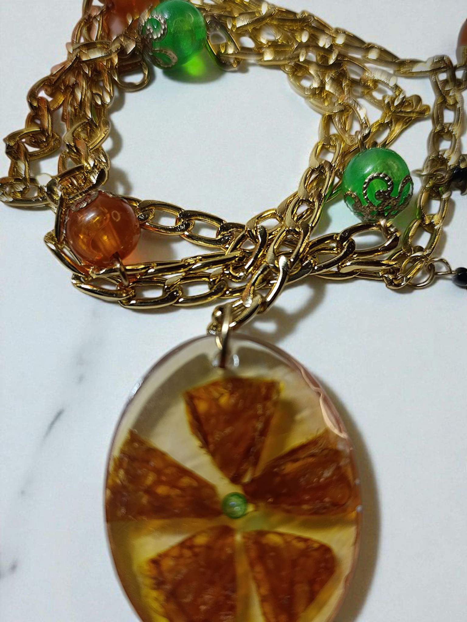 Papuošalų komplektas su džiovintais apelsinais