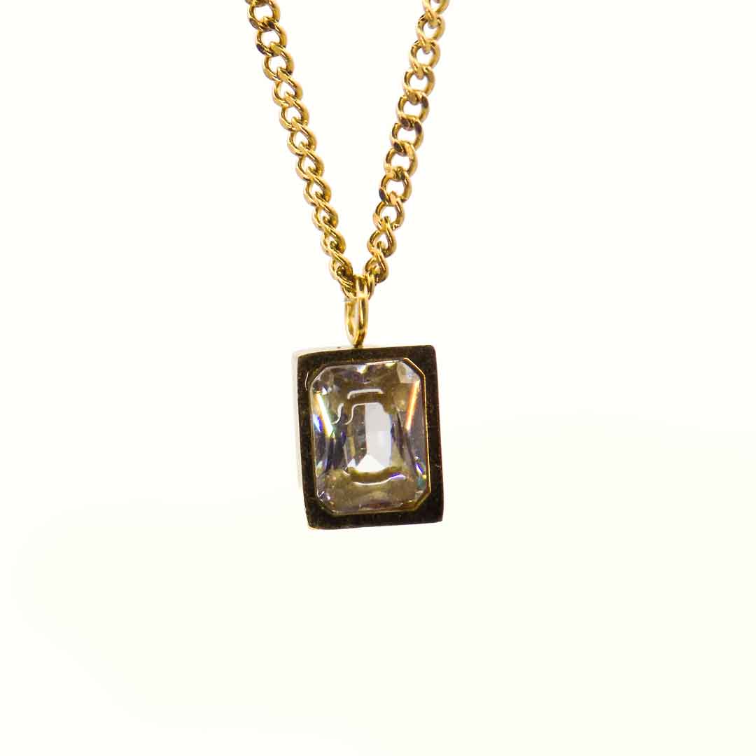 Gold layered necklace with crystal pendant