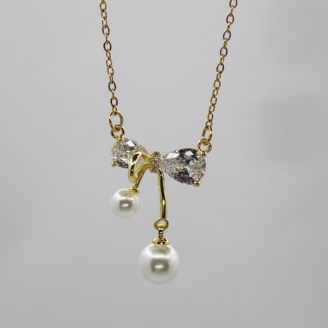 Elegant Gold Bow Pendant Necklace
