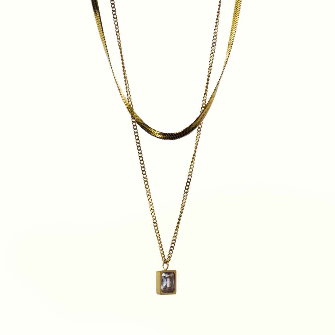 Gold layered necklace with crystal pendant