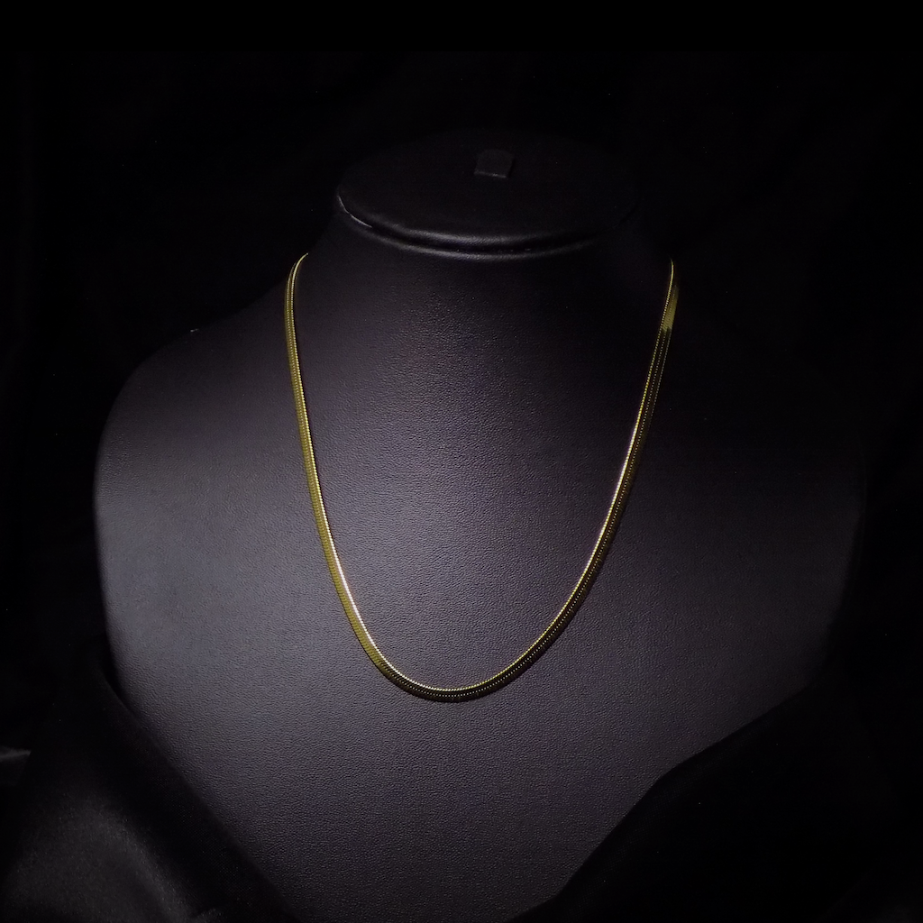 Flat snake gold necklace