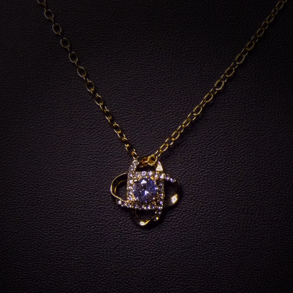 Dancing diamond saturn pendant necklace