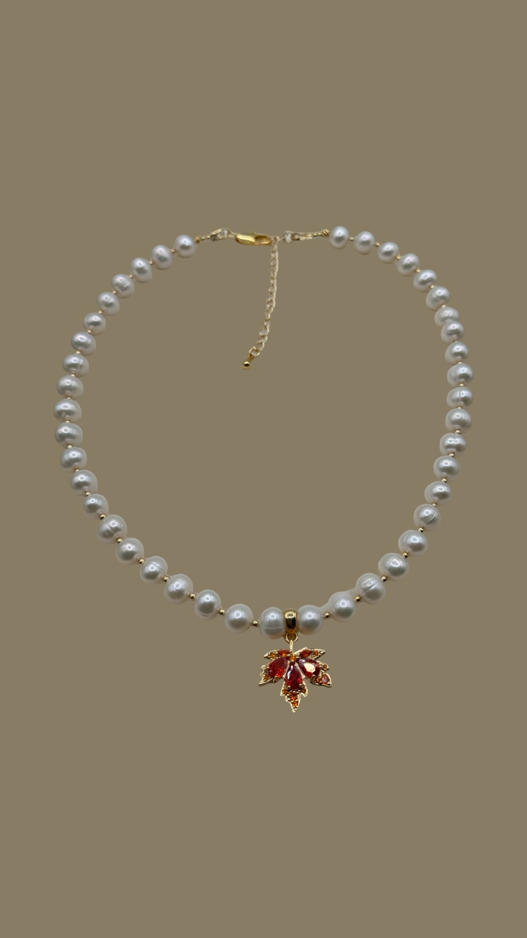 Pearl Necklace with maple Gold Pendant