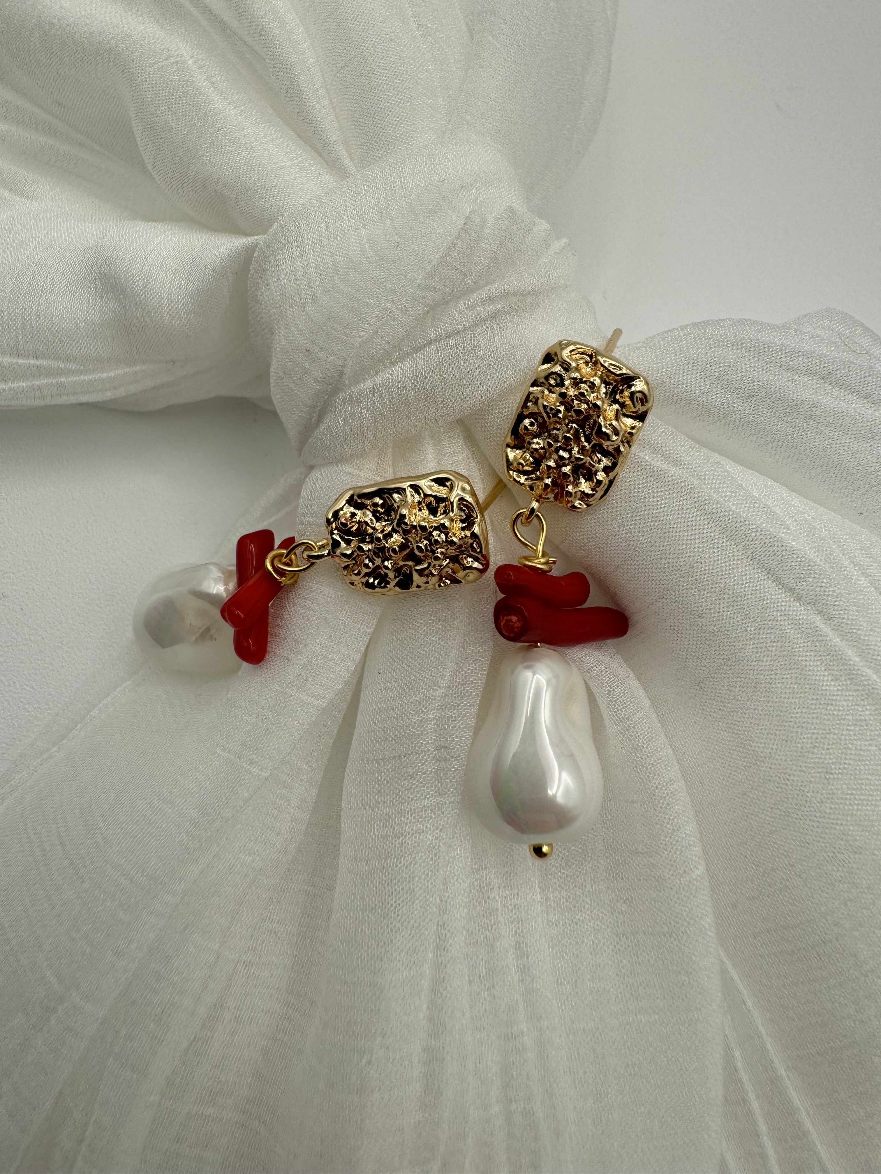 Gold textured earrings with baroque pearls and red coral