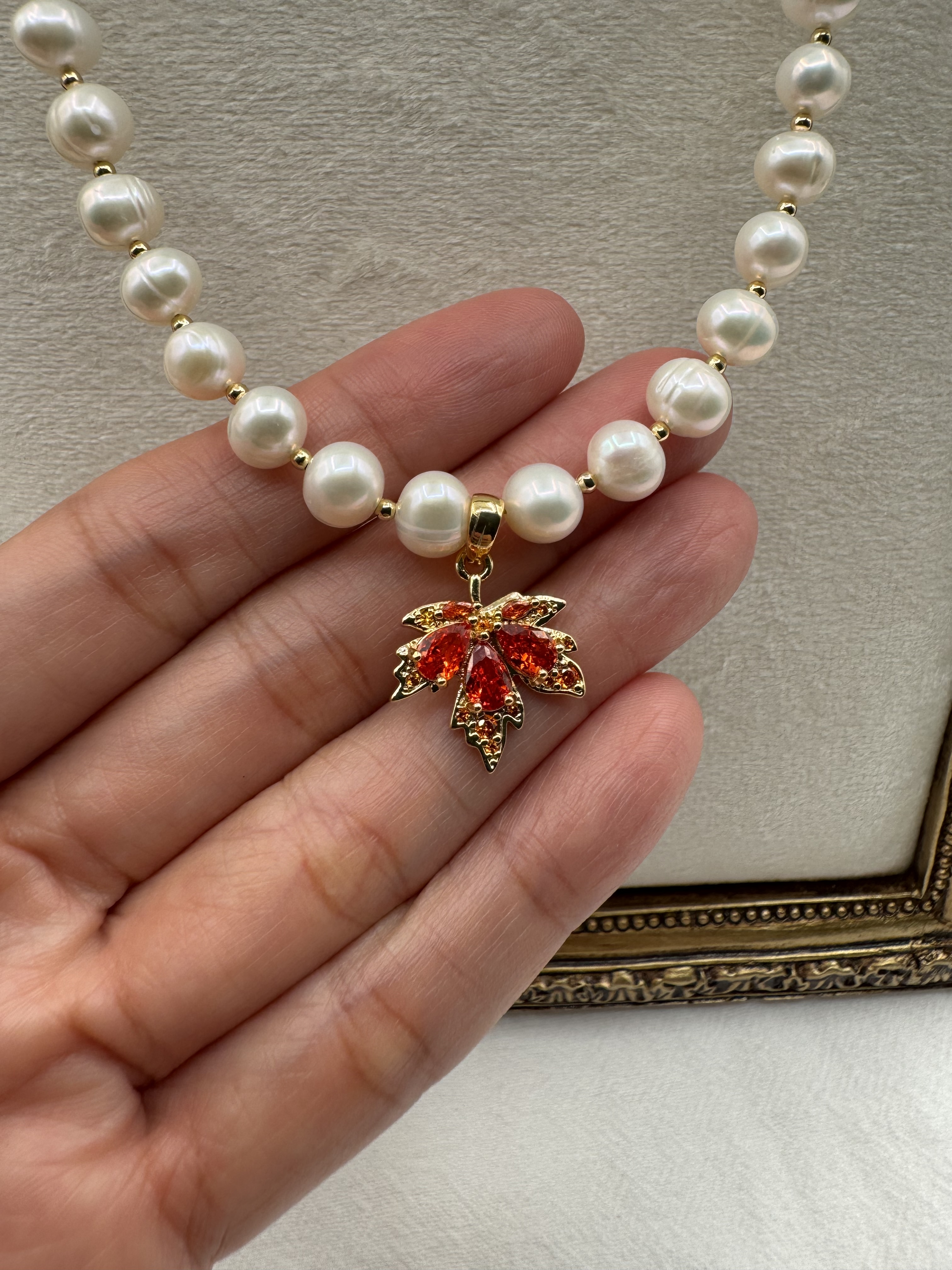 Pearl Necklace with maple Gold Pendant