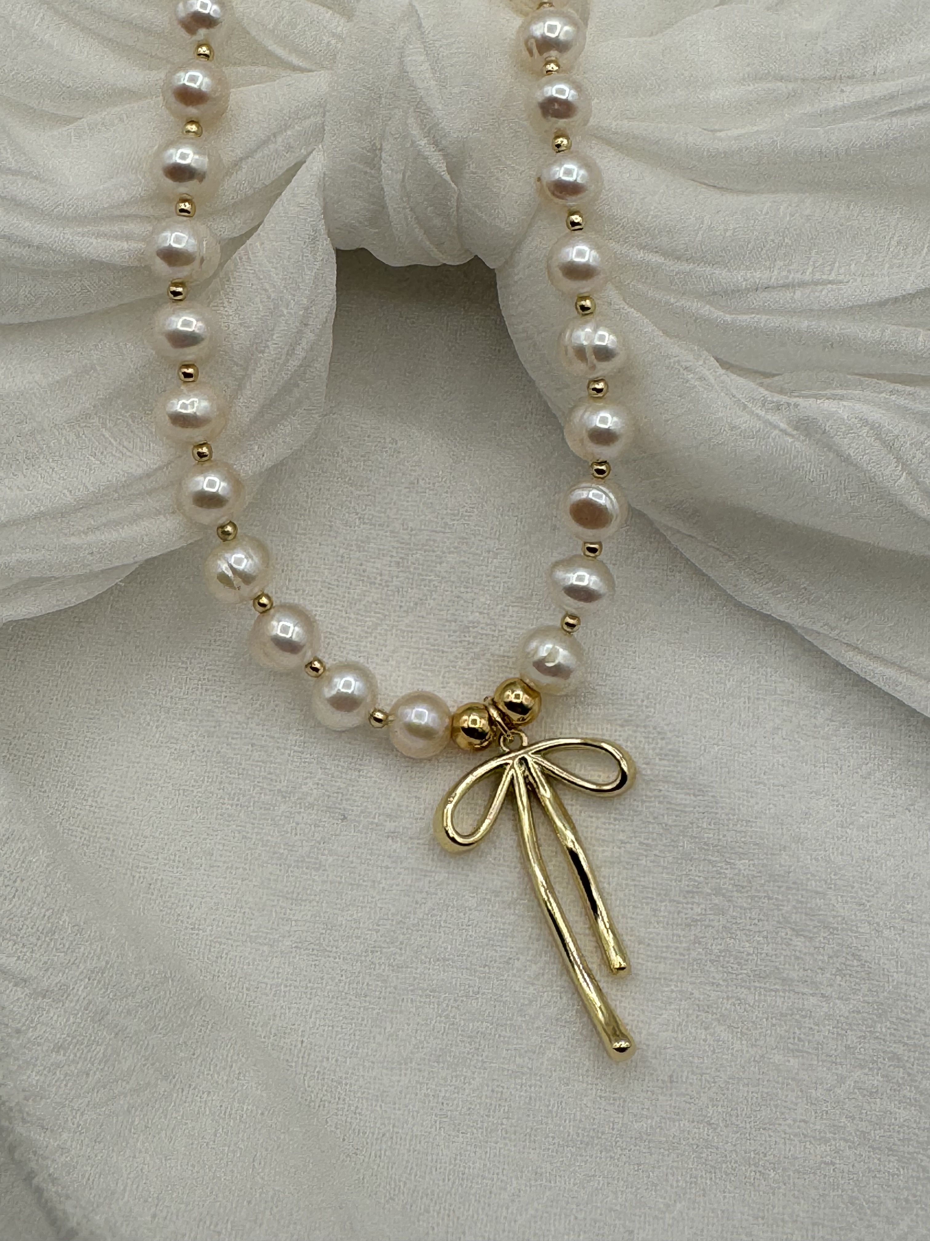 Pearl Necklace with Gold Bow Pendant