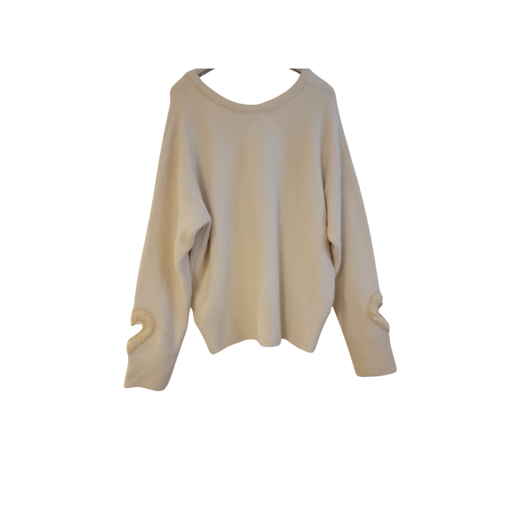 Pull beige à motif cœur