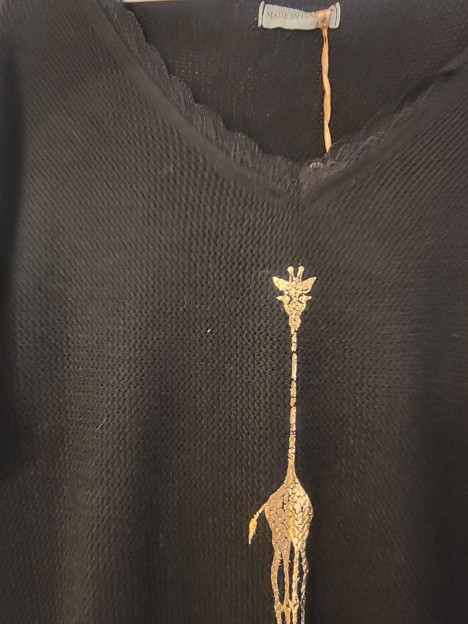 Pull noir avec motif girafe