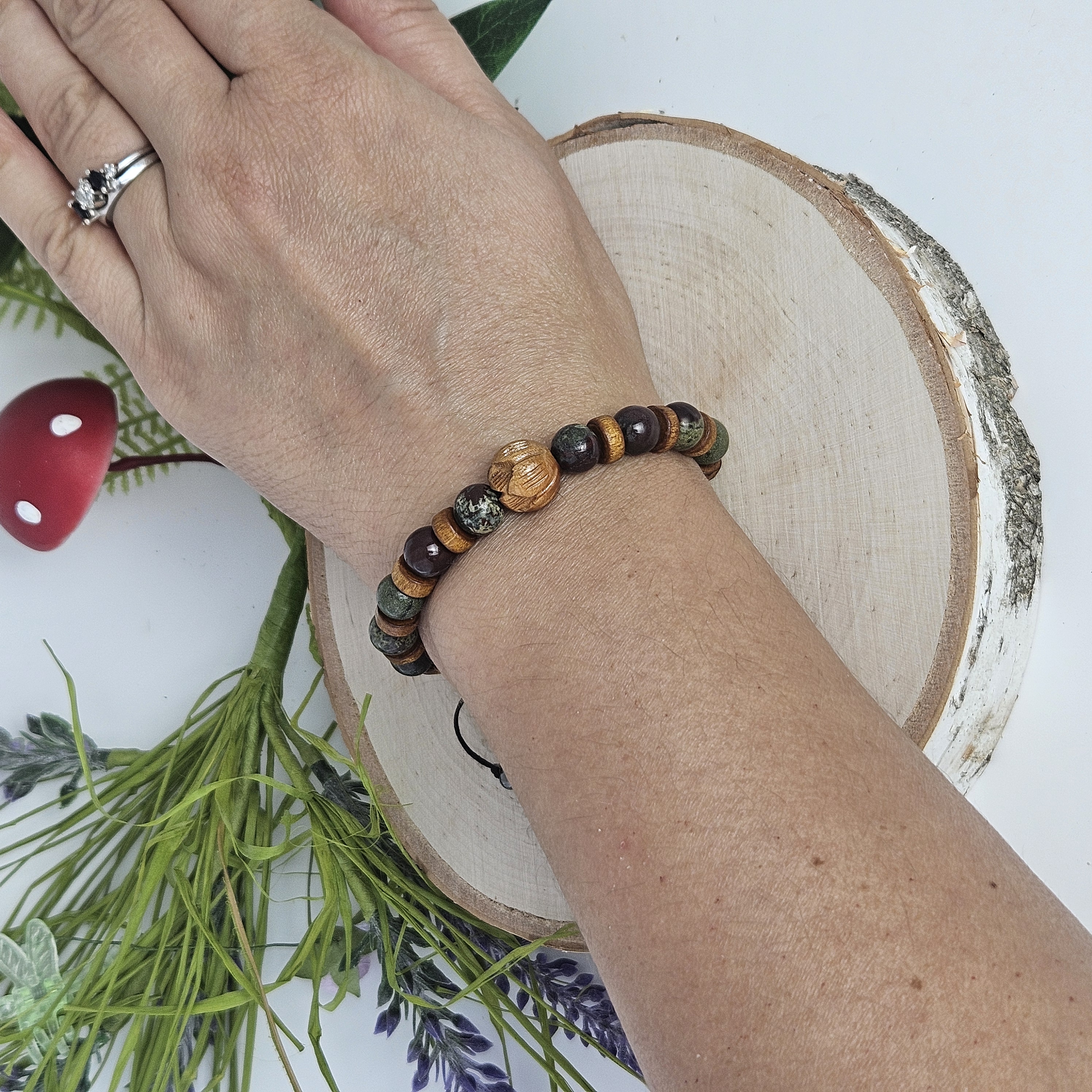 Carved Wooden Lotus and Dragon's Blood Bracelet
