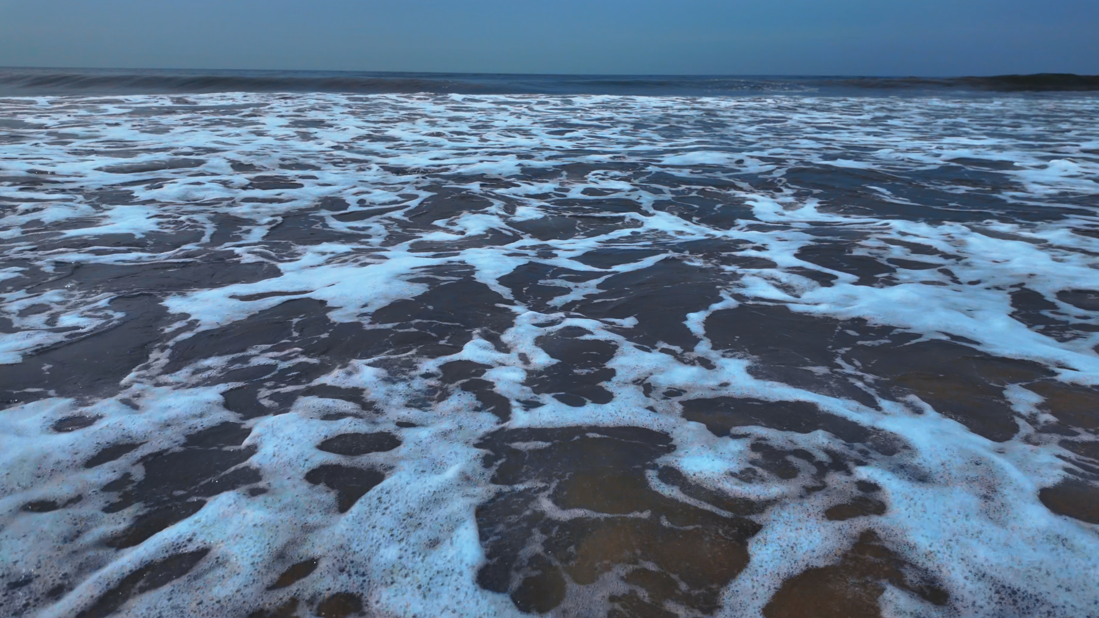 4K Beach Waves Foam Closeup