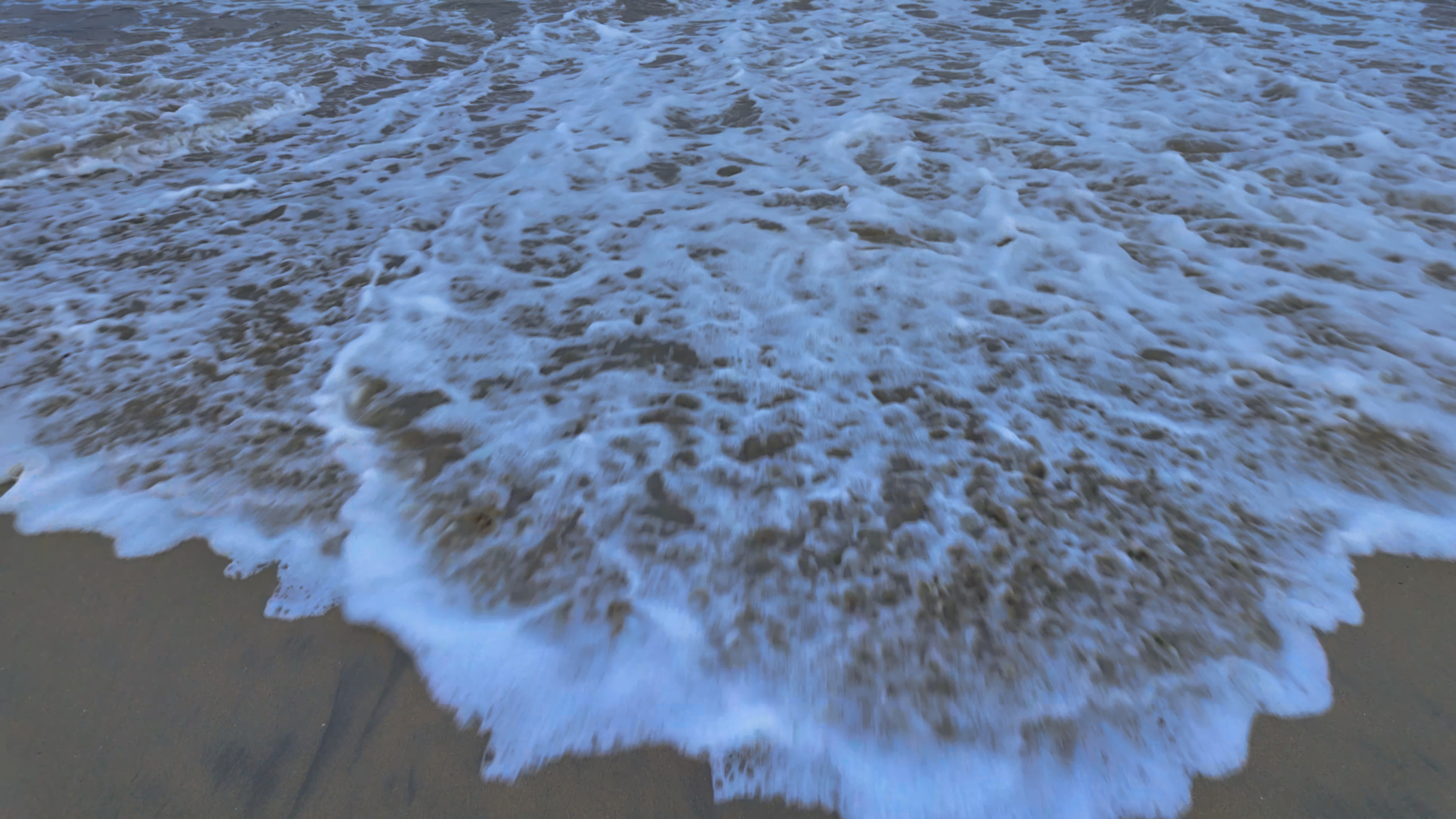 Stunning 4K Coastal Landscape | Gentle Waves on a Quiet Beach - Premium Waves Stock Footages