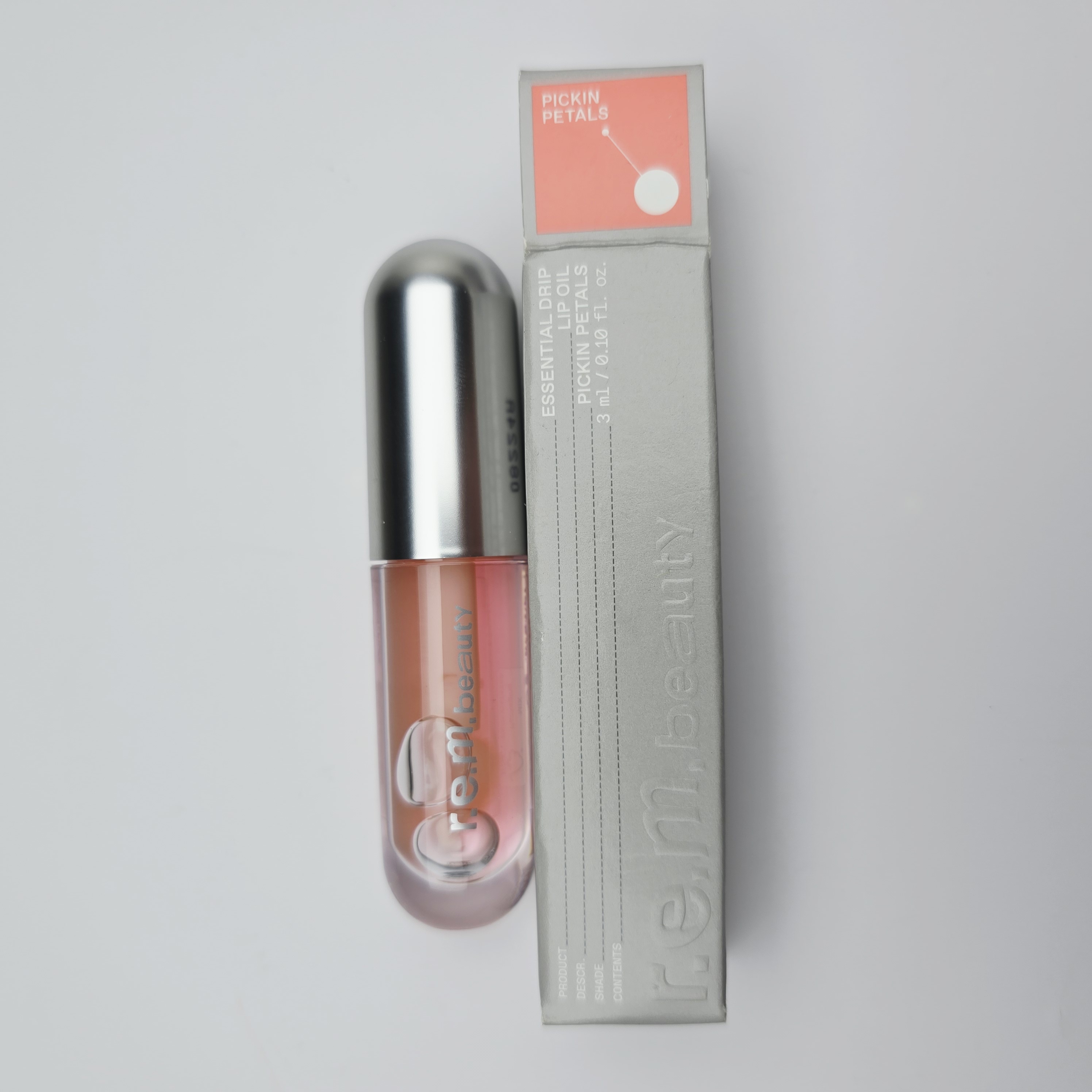 r.e.m. beauty lip gloss (Pickin Petals)