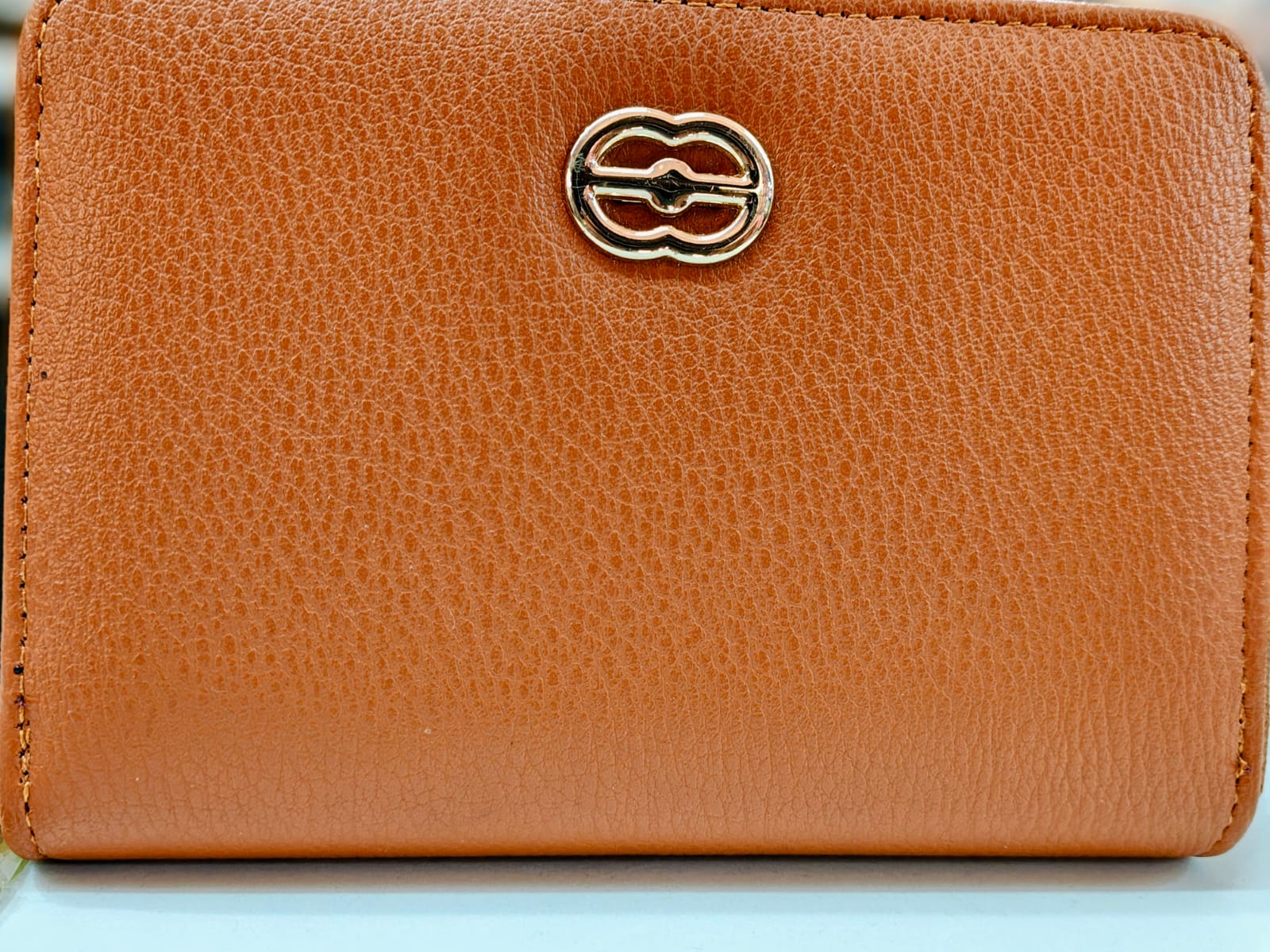 Cartera de cuero marrón