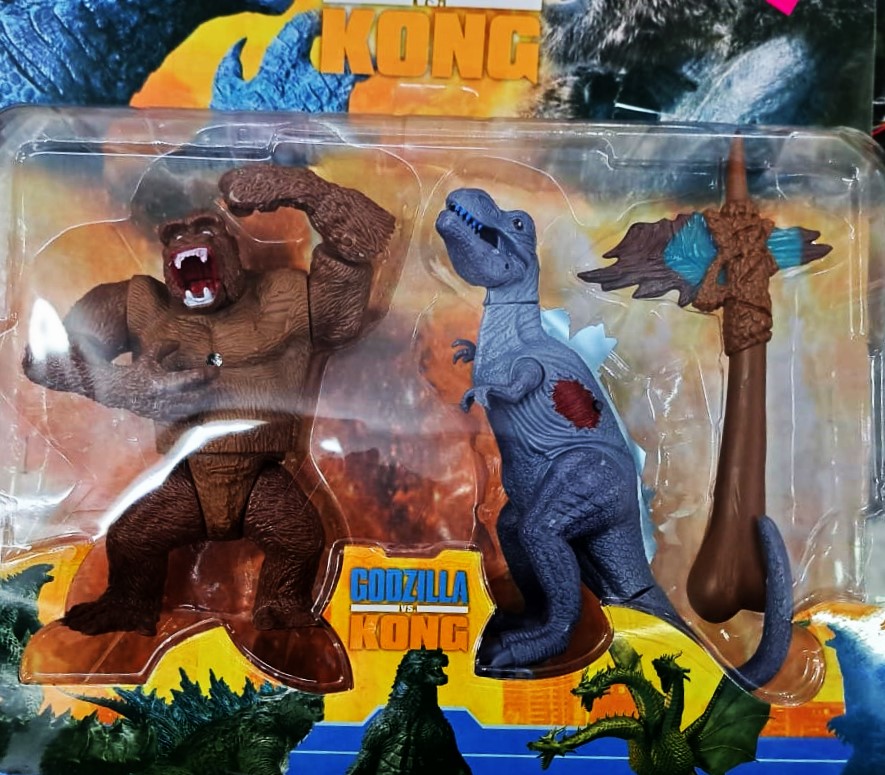 Muñecos de Kong y dinosaurio